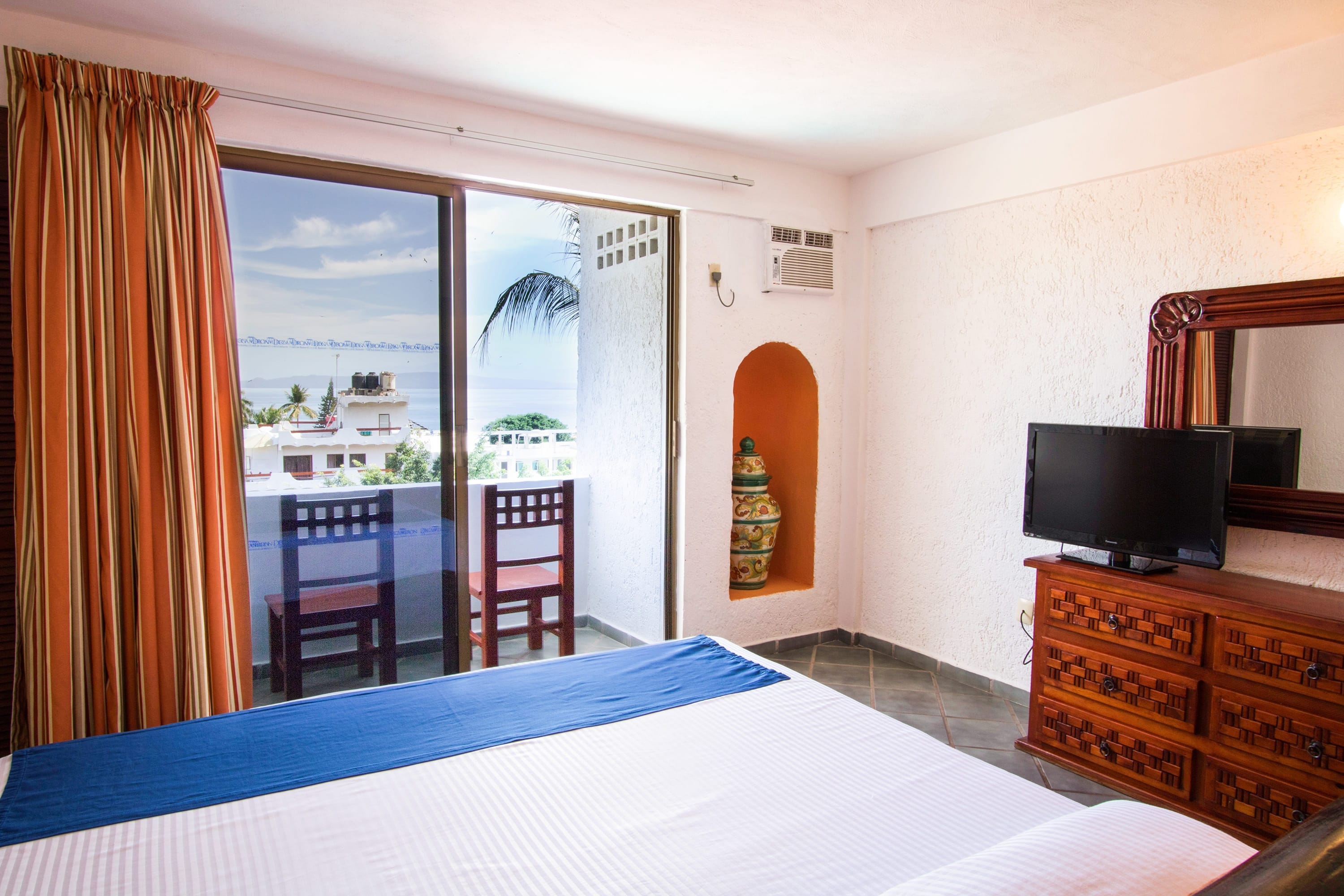 Guest room at the Decameron Los Cocos Guayabitos, Ramada All Inclusive Resort in Rincon de Guayabitos, Other than US/Canada