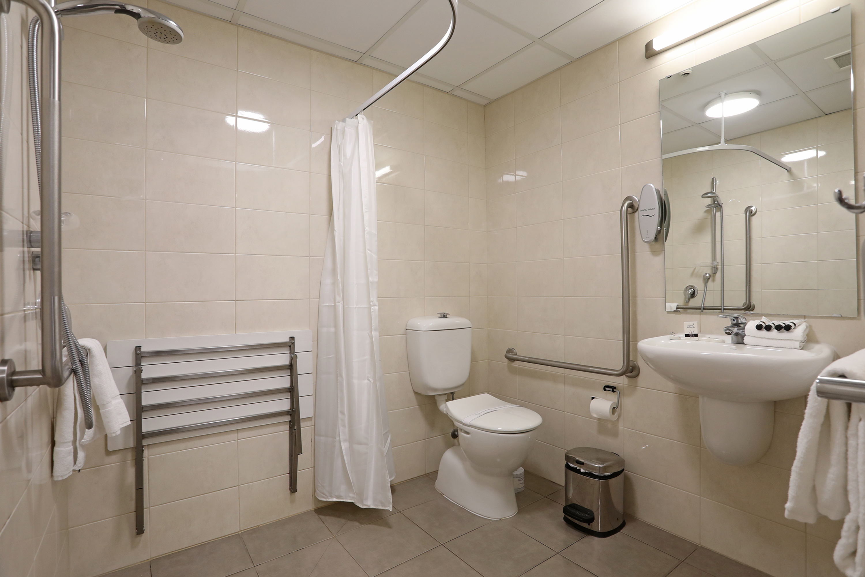 Guest room bath at the Ramada Encore by Wyndham Palmerston North in Palmerston North Central, Other than US/Canada