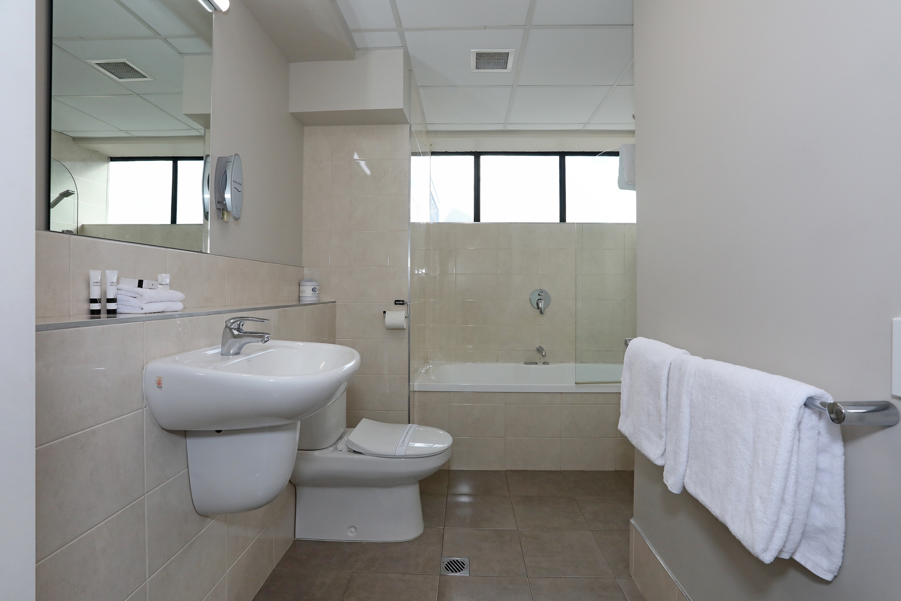 Guest room bath at the Ramada Encore by Wyndham Palmerston North in Palmerston North Central, Other than US/Canada