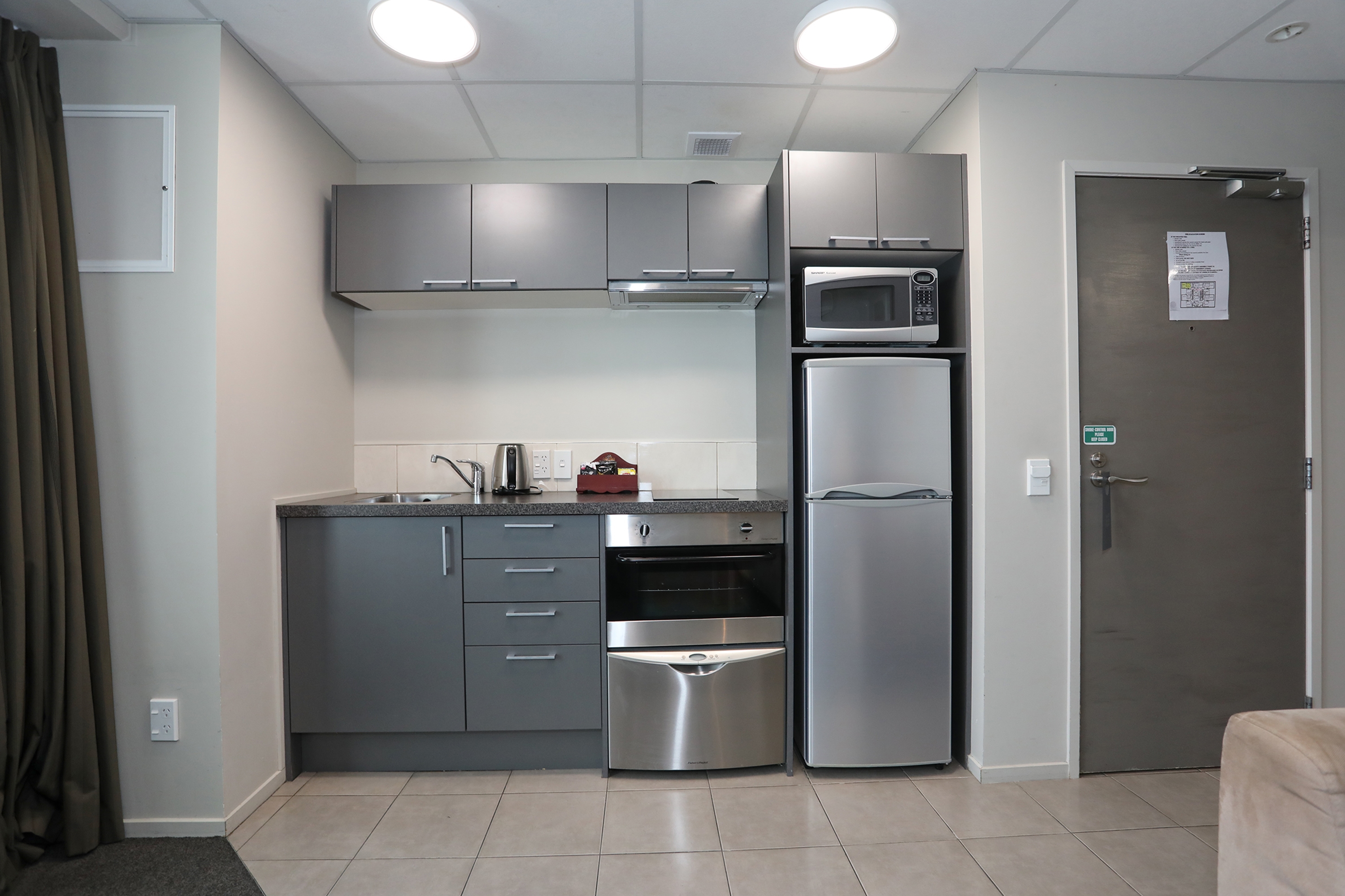 Guest room at the Ramada Encore by Wyndham Palmerston North in Palmerston North Central, Other than US/Canada