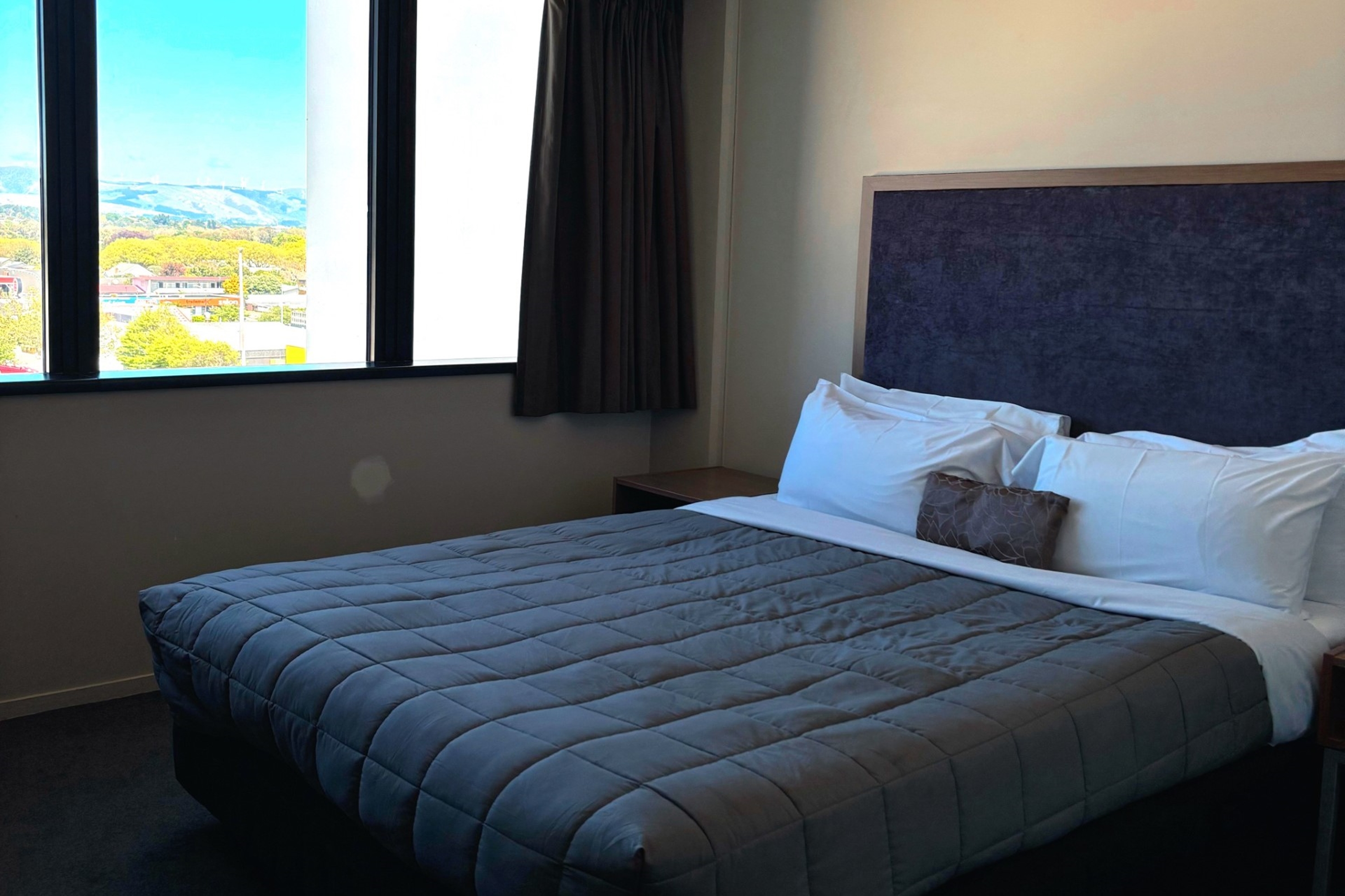 Guest room at the Ramada Encore by Wyndham Palmerston North in Palmerston North Central, Other than US/Canada