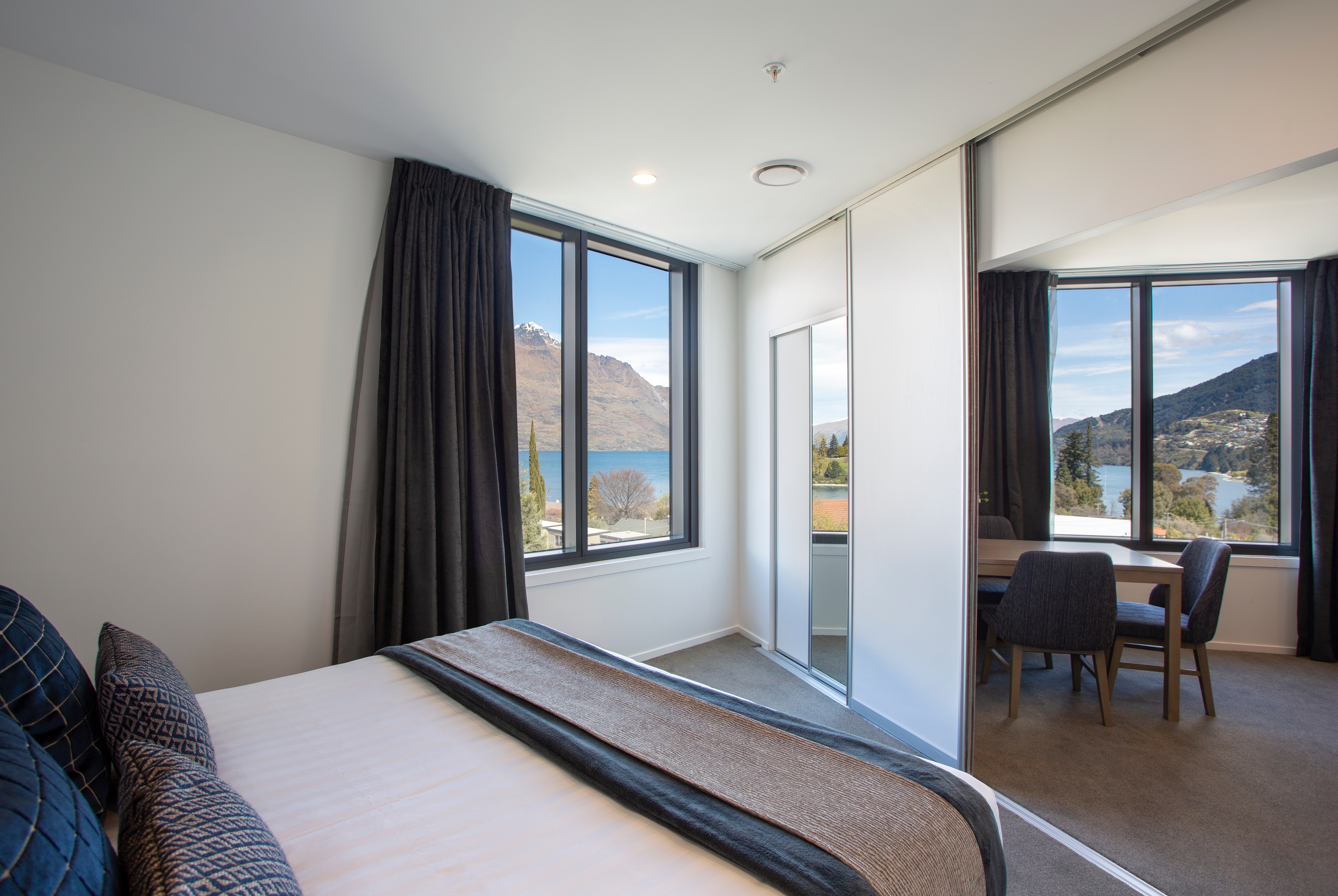Guest room at the Ramada By Wyndham Queenstown Central in Queenstown, Other than US/Canada