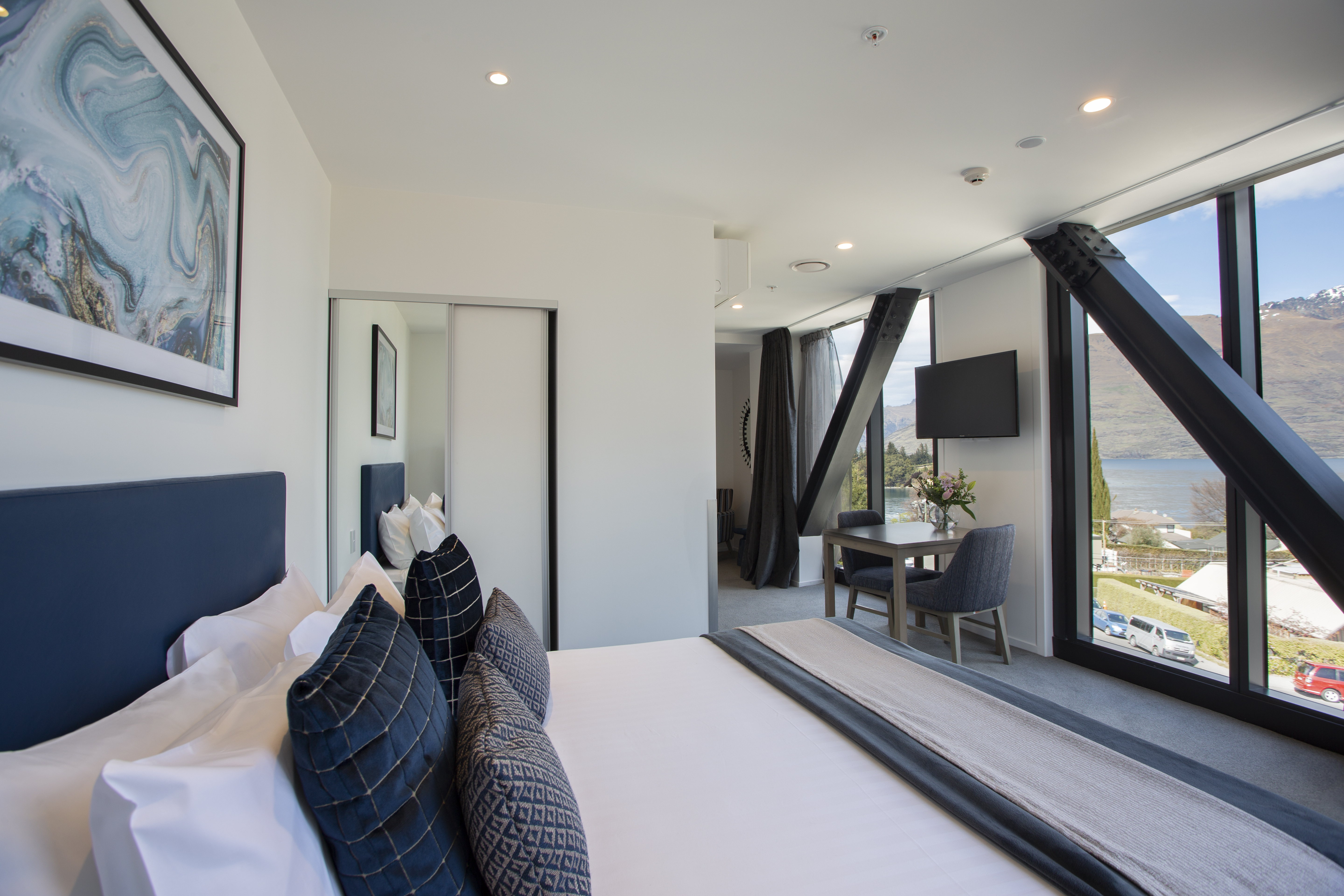 Guest room at the Ramada By Wyndham Queenstown Central in Queenstown, Other than US/Canada