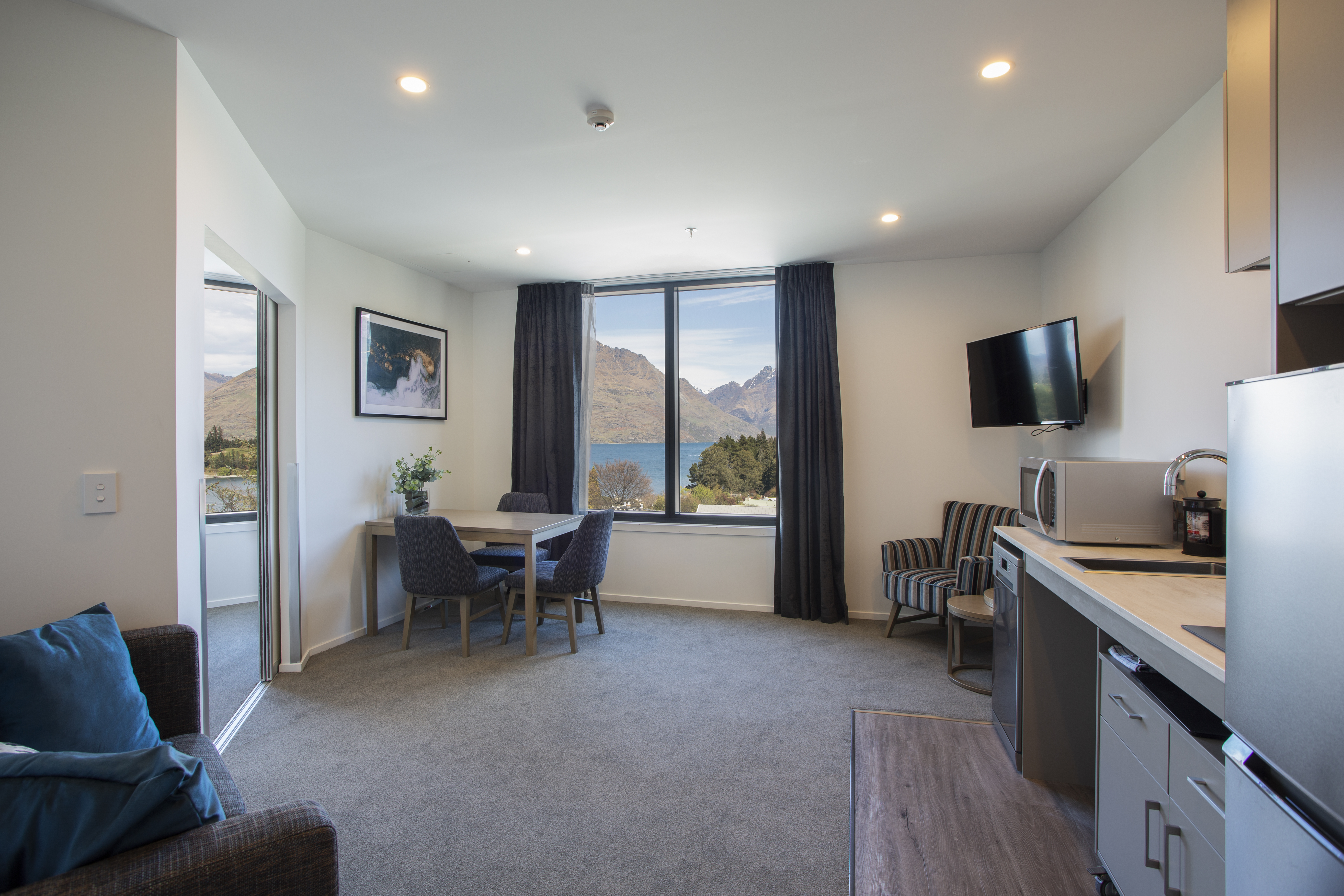 Guest room at the Ramada By Wyndham Queenstown Central in Queenstown, Other than US/Canada