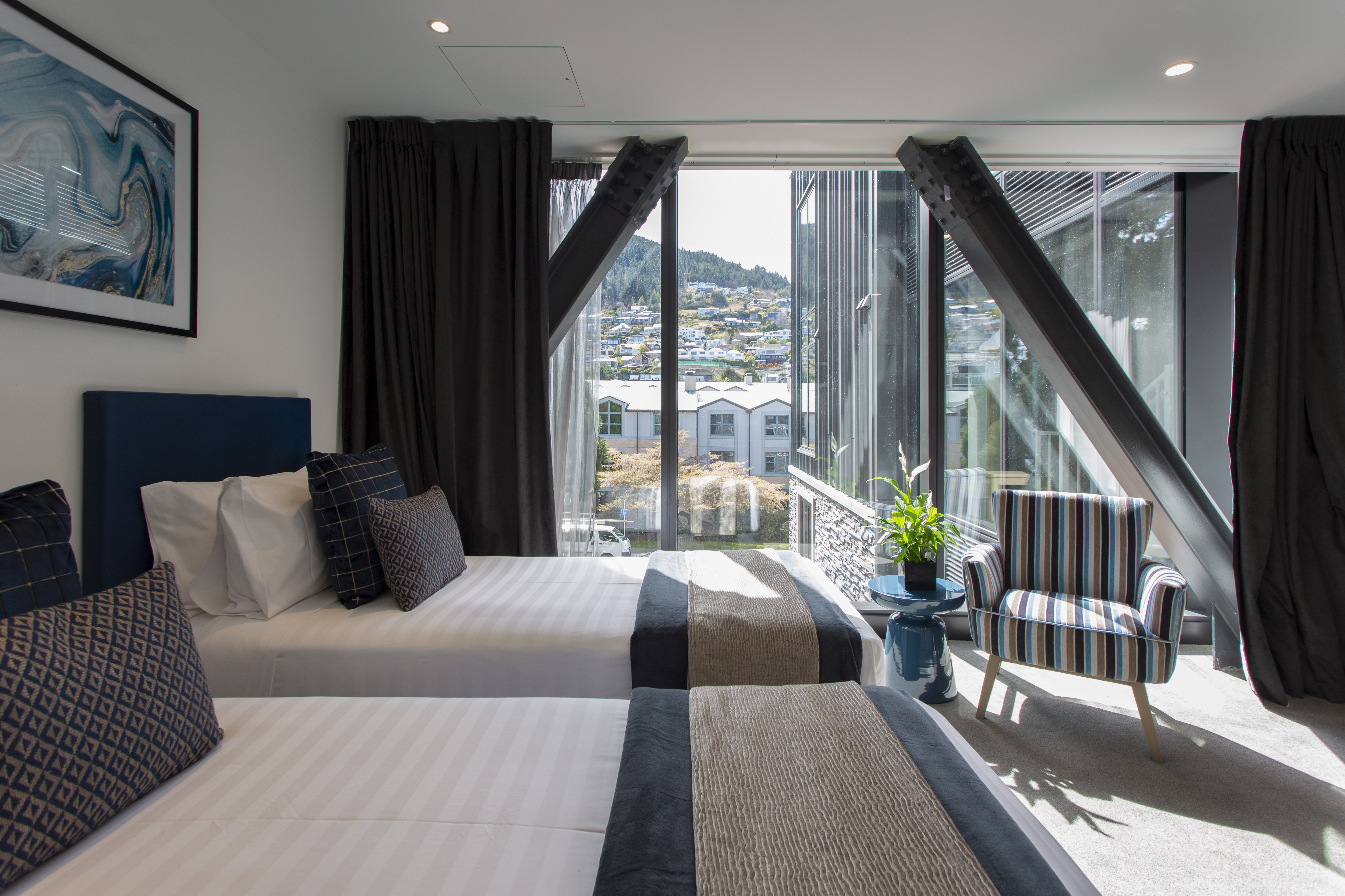 Guest room at the Ramada By Wyndham Queenstown Central in Queenstown, Other than US/Canada