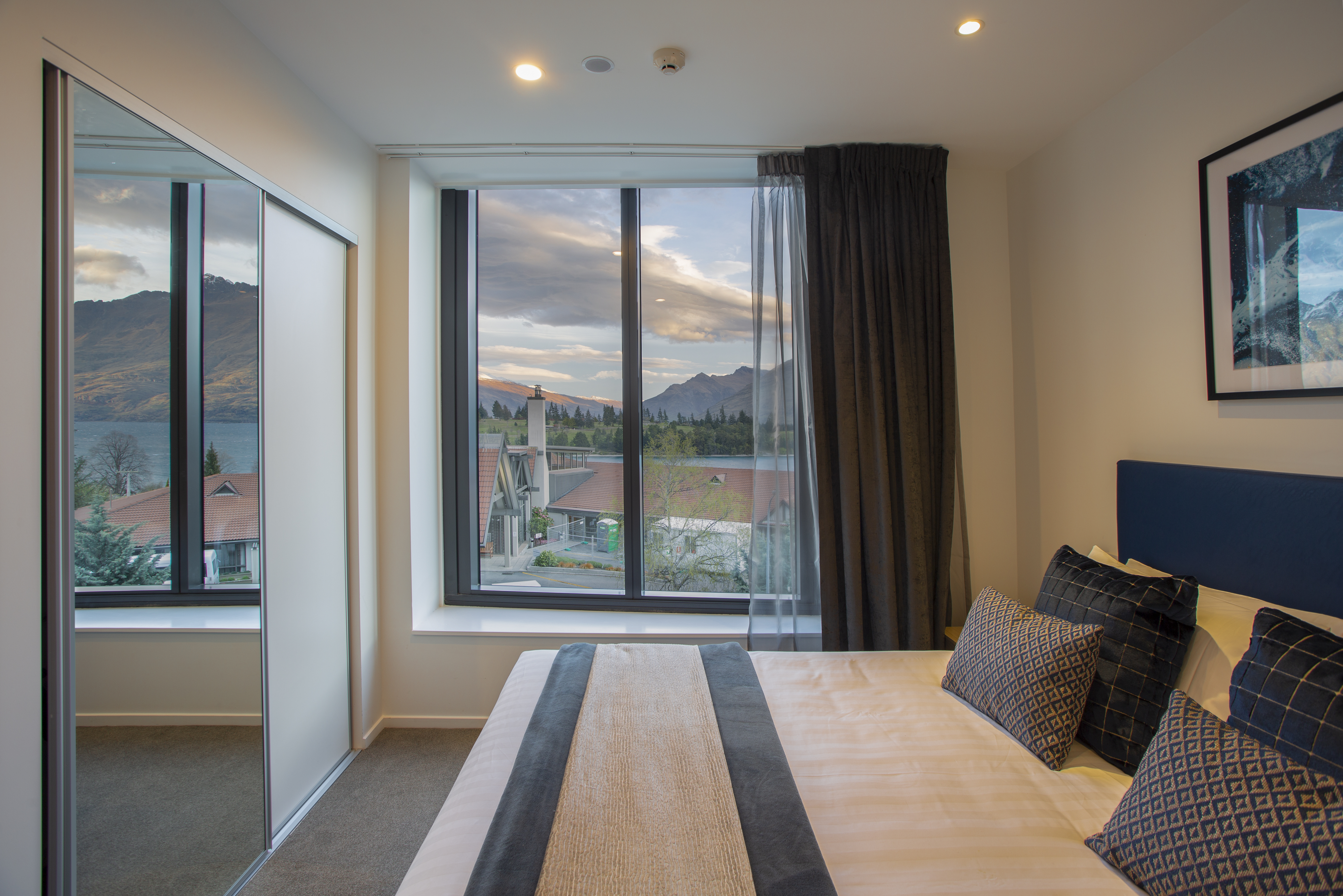 Guest room at the Ramada By Wyndham Queenstown Central in Queenstown, Other than US/Canada