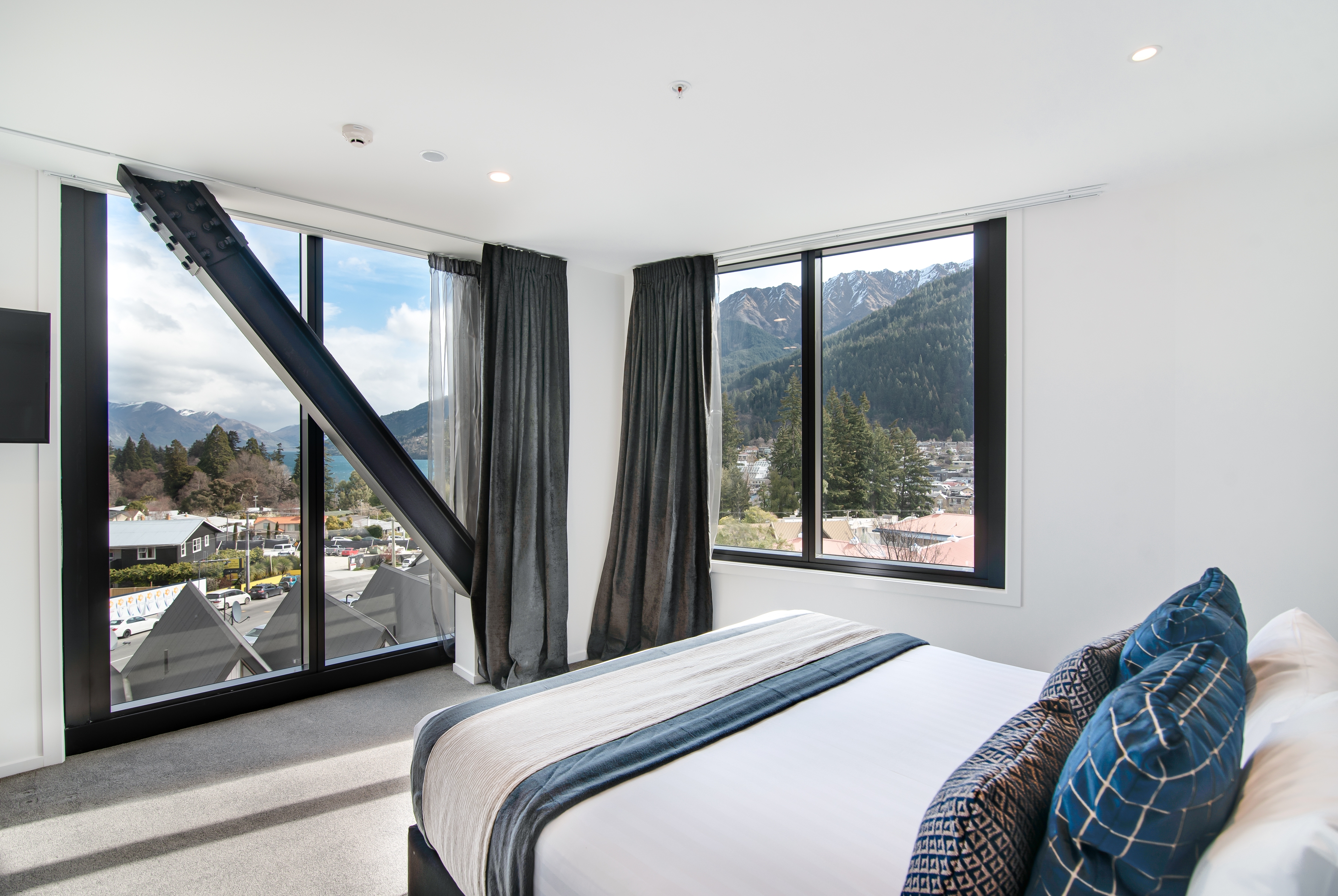 Guest room at the Ramada By Wyndham Queenstown Central in Queenstown, Other than US/Canada