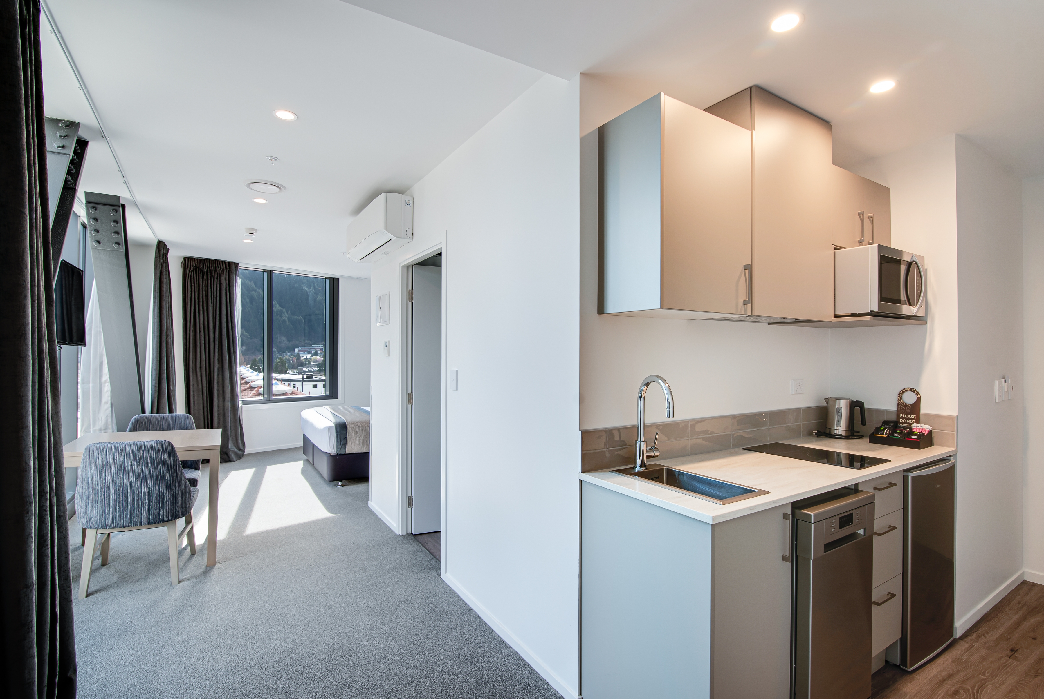 Guest room at the Ramada By Wyndham Queenstown Central in Queenstown, Other than US/Canada