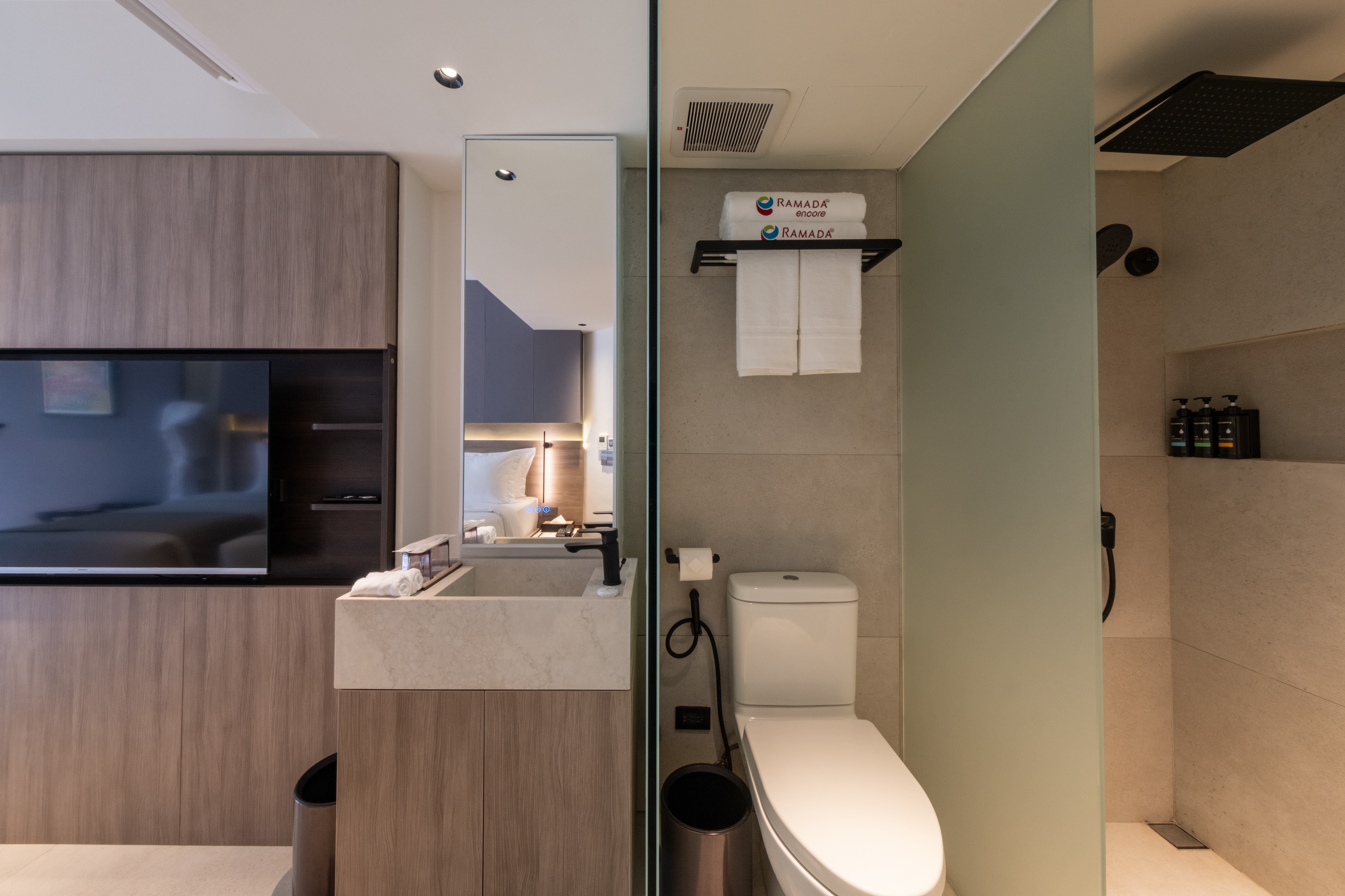 Guest room bath at the Ramada Encore by Wyndham Boracay White Beach in Malay, Other than US/Canada