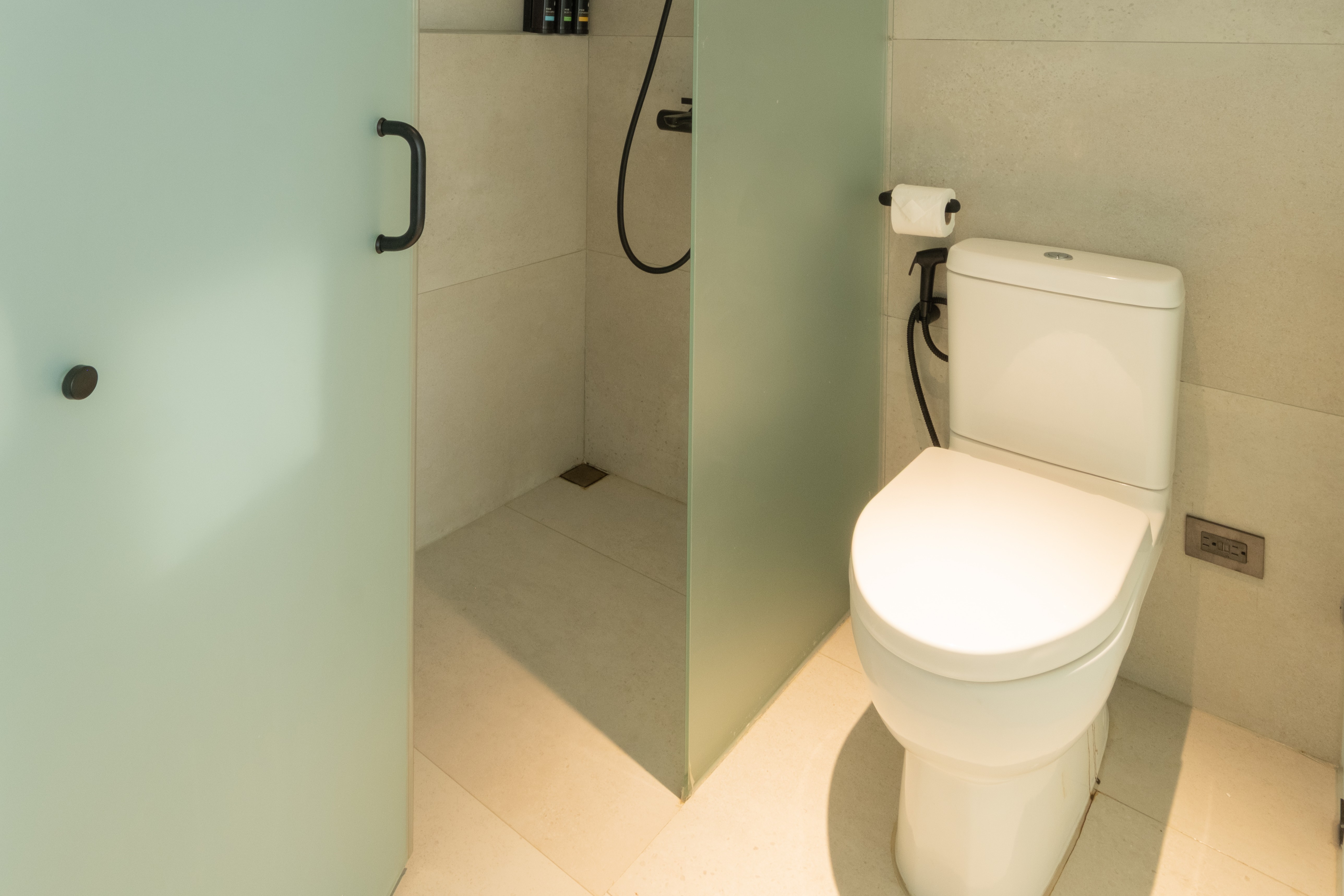 Guest room bath at the Ramada Encore by Wyndham Boracay White Beach in Malay, Other than US/Canada