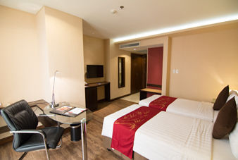 Guest room at the Ramada by Wyndham Manila Central in Manila, Other than US/Canada