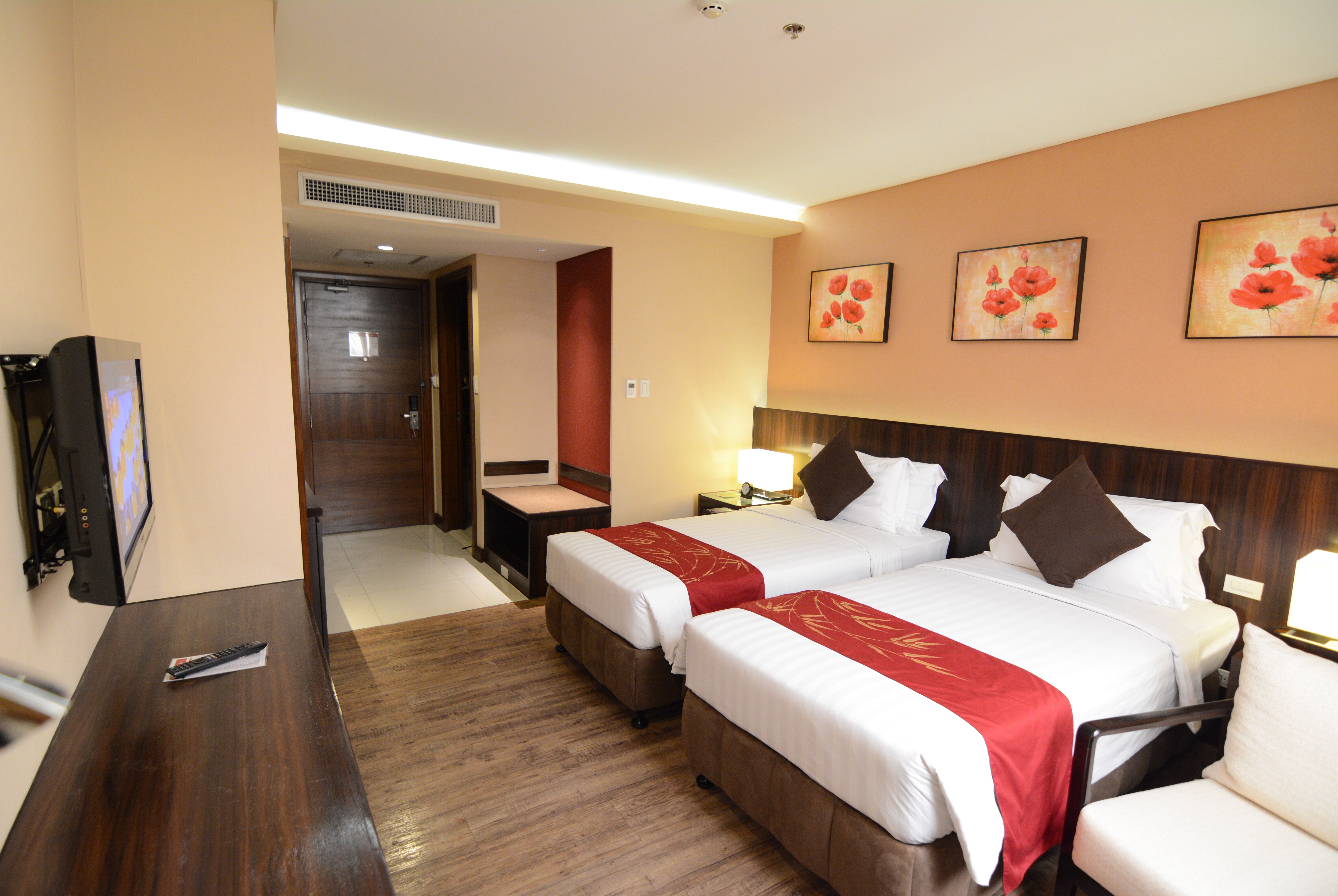 Guest room at the Ramada by Wyndham Manila Central in Manila, Other than US/Canada