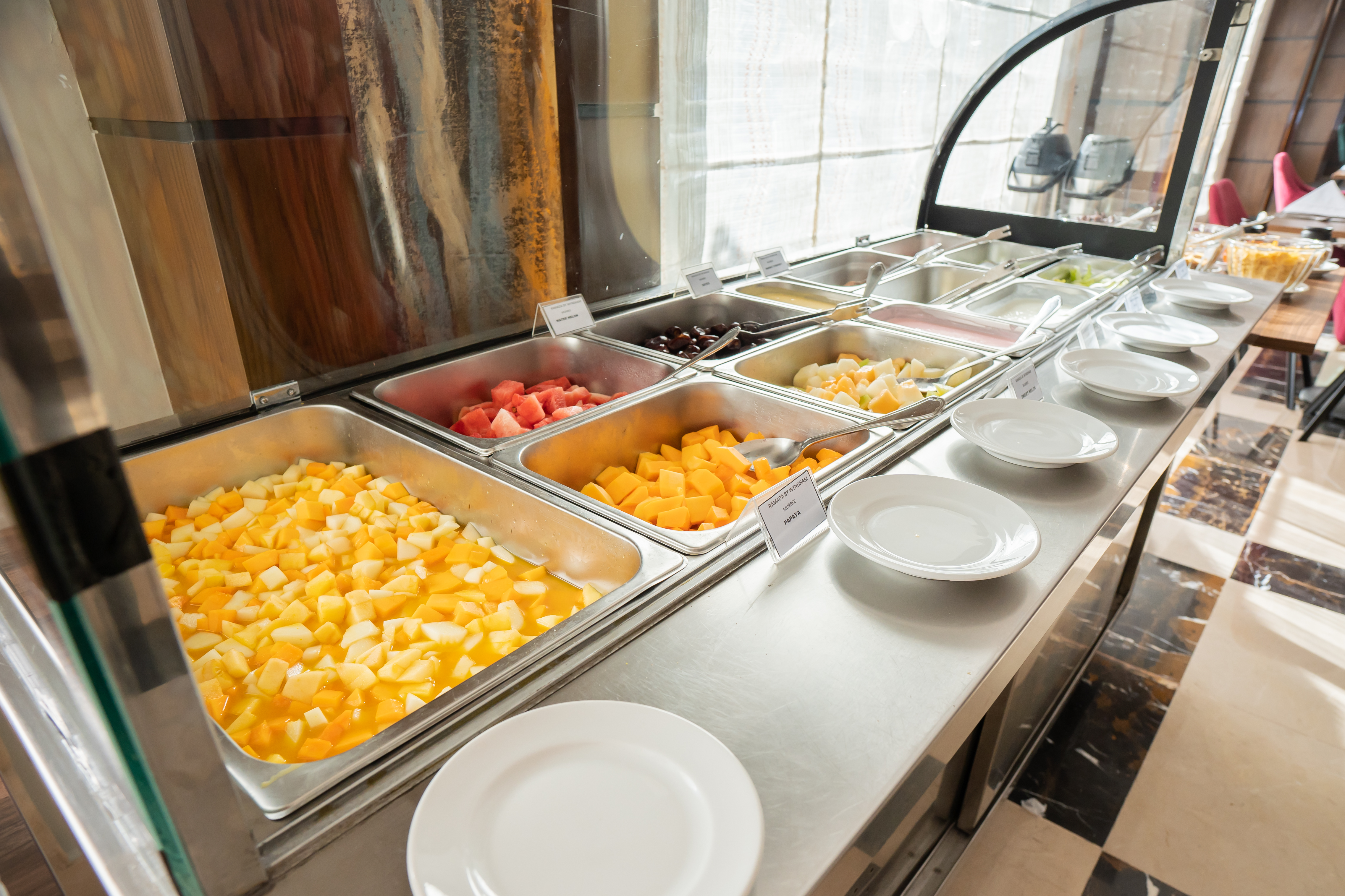 Ramada by Wyndham Murree Lower Topa Resort restaurant breakfast area with seating in Lower Topa, Murree, Other than US/Canada