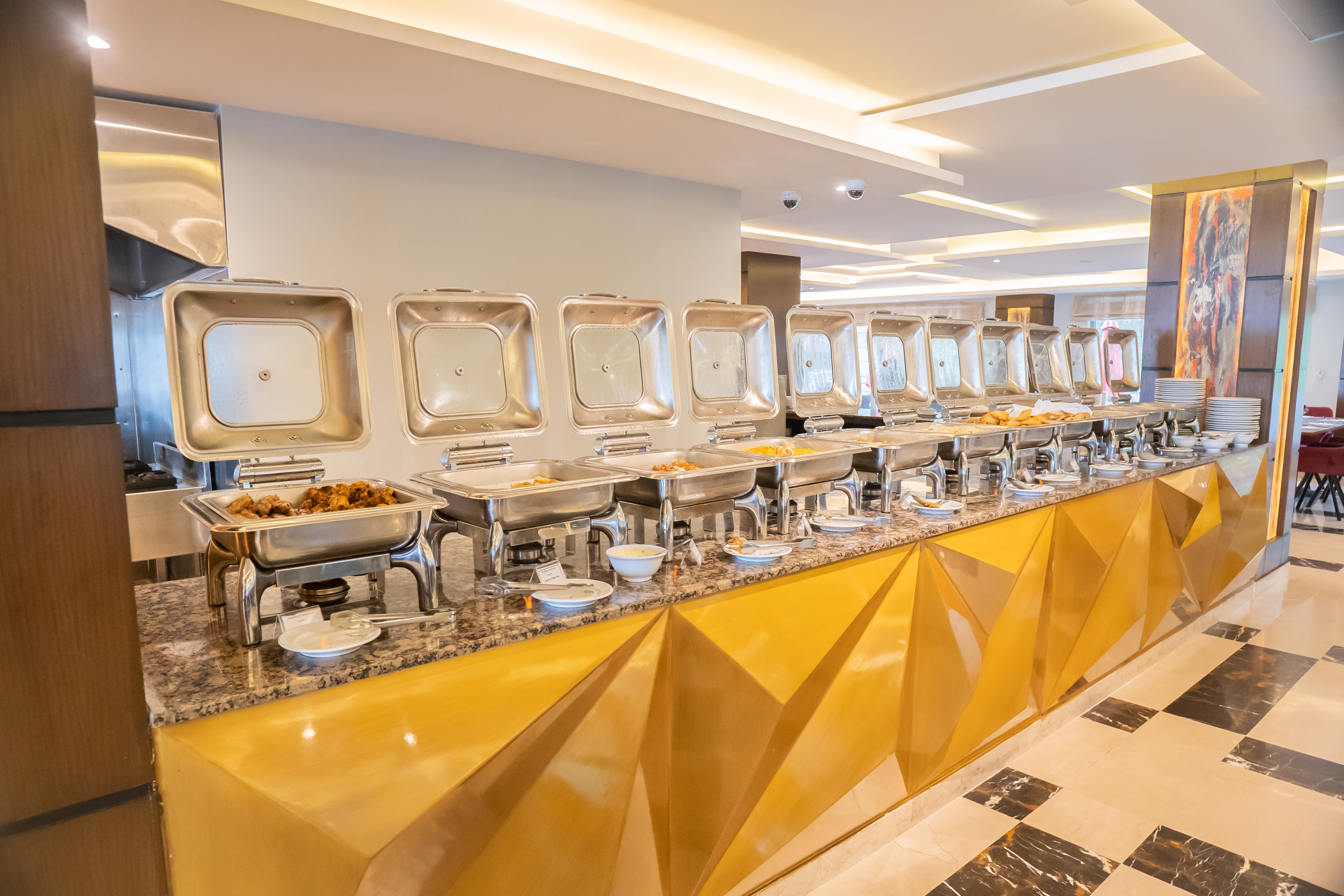 Ramada by Wyndham Murree Lower Topa Resort restaurant breakfast area with seating in Lower Topa, Murree, Other than US/Canada