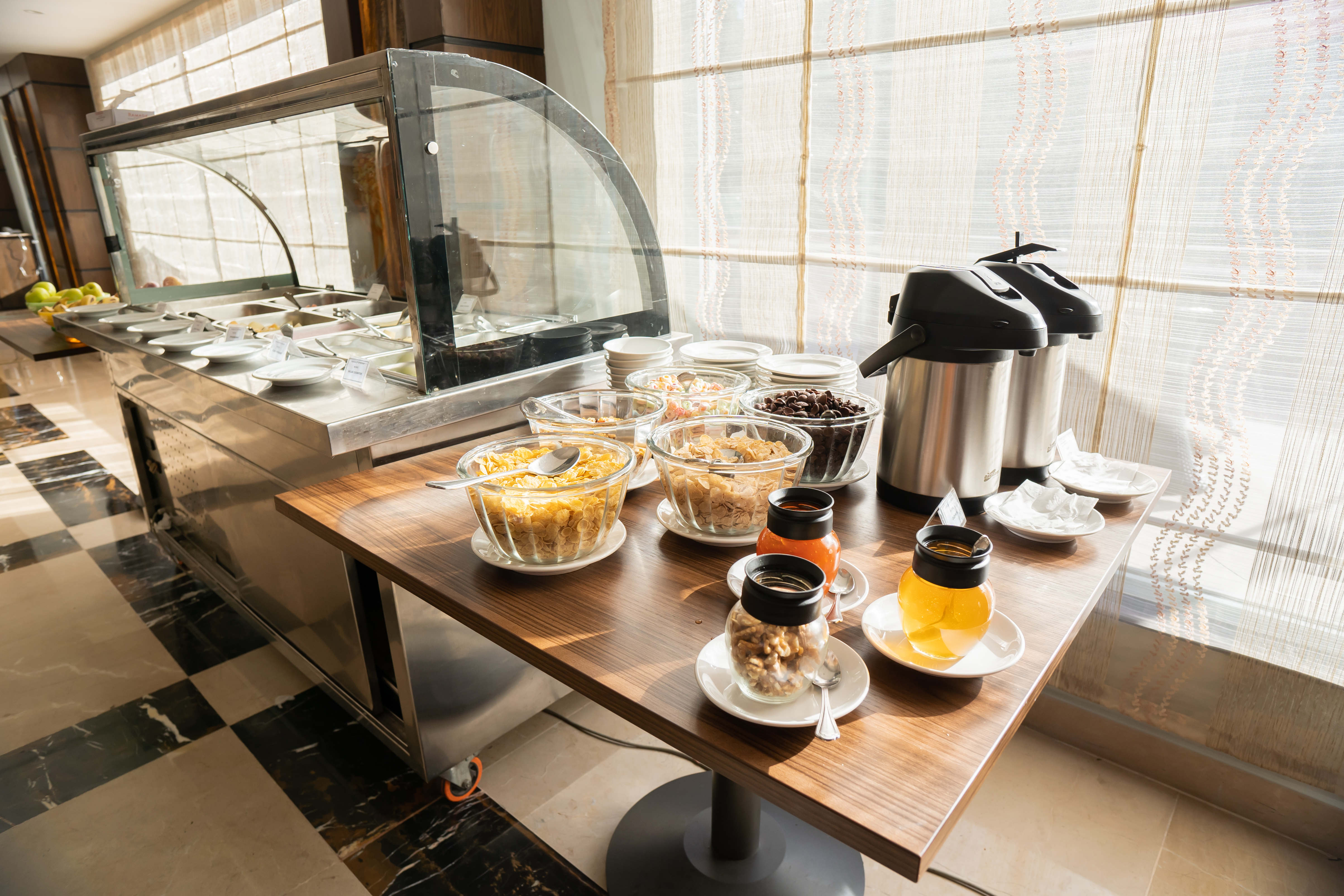 Ramada by Wyndham Murree Lower Topa Resort restaurant breakfast area with seating in Lower Topa, Murree, Other than US/Canada