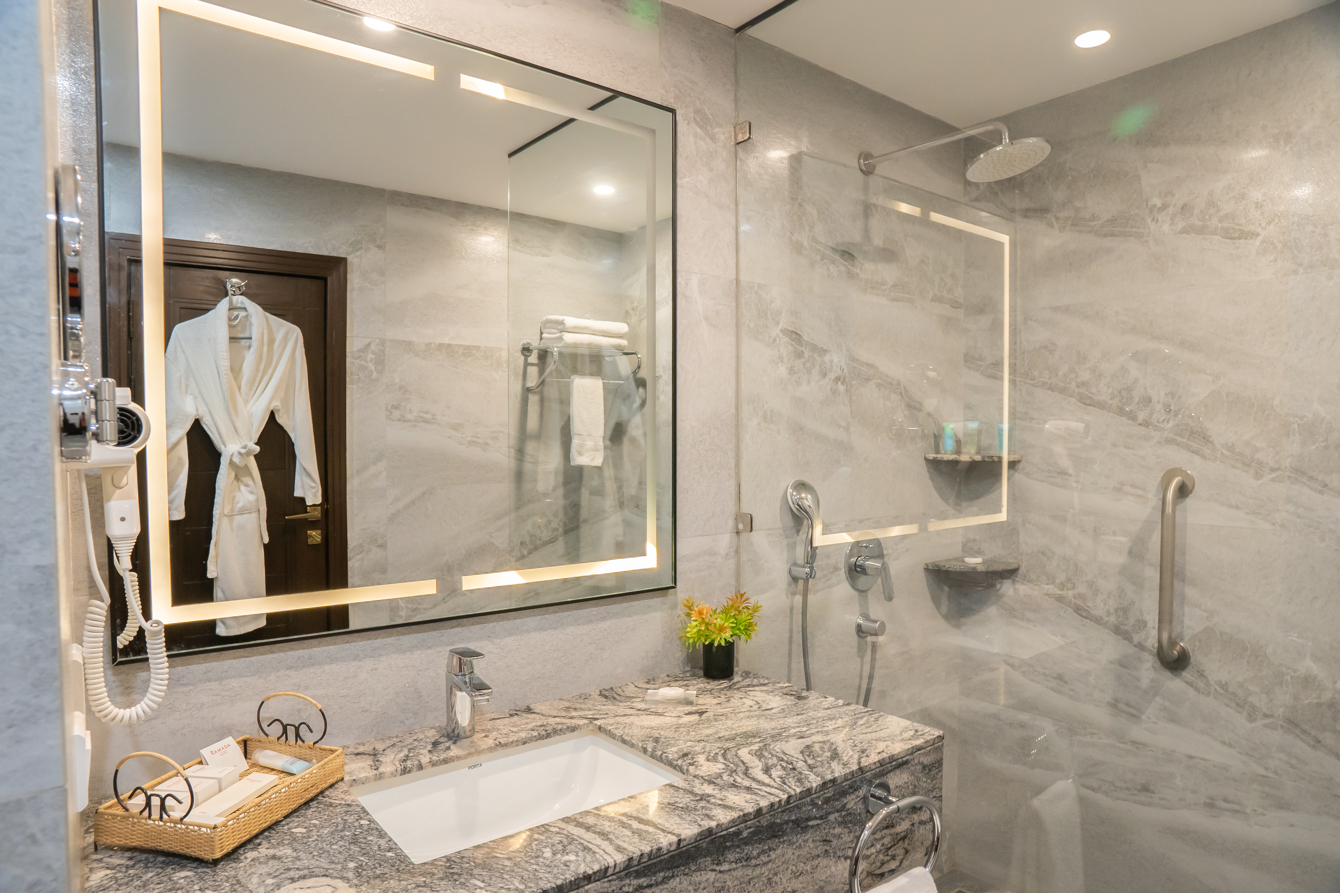 Guest room bath at the Ramada by Wyndham Murree Lower Topa Resort in Lower Topa, Murree, Other than US/Canada