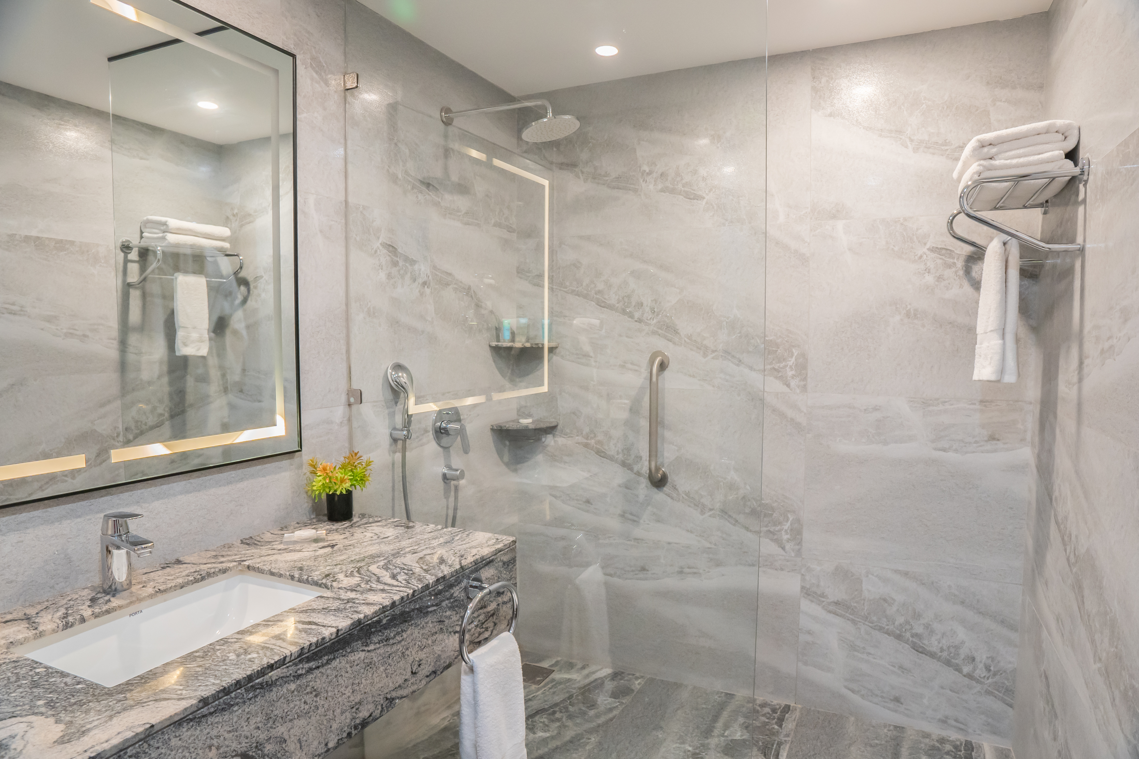 Guest room bath at the Ramada by Wyndham Murree Lower Topa Resort in Lower Topa, Murree, Other than US/Canada