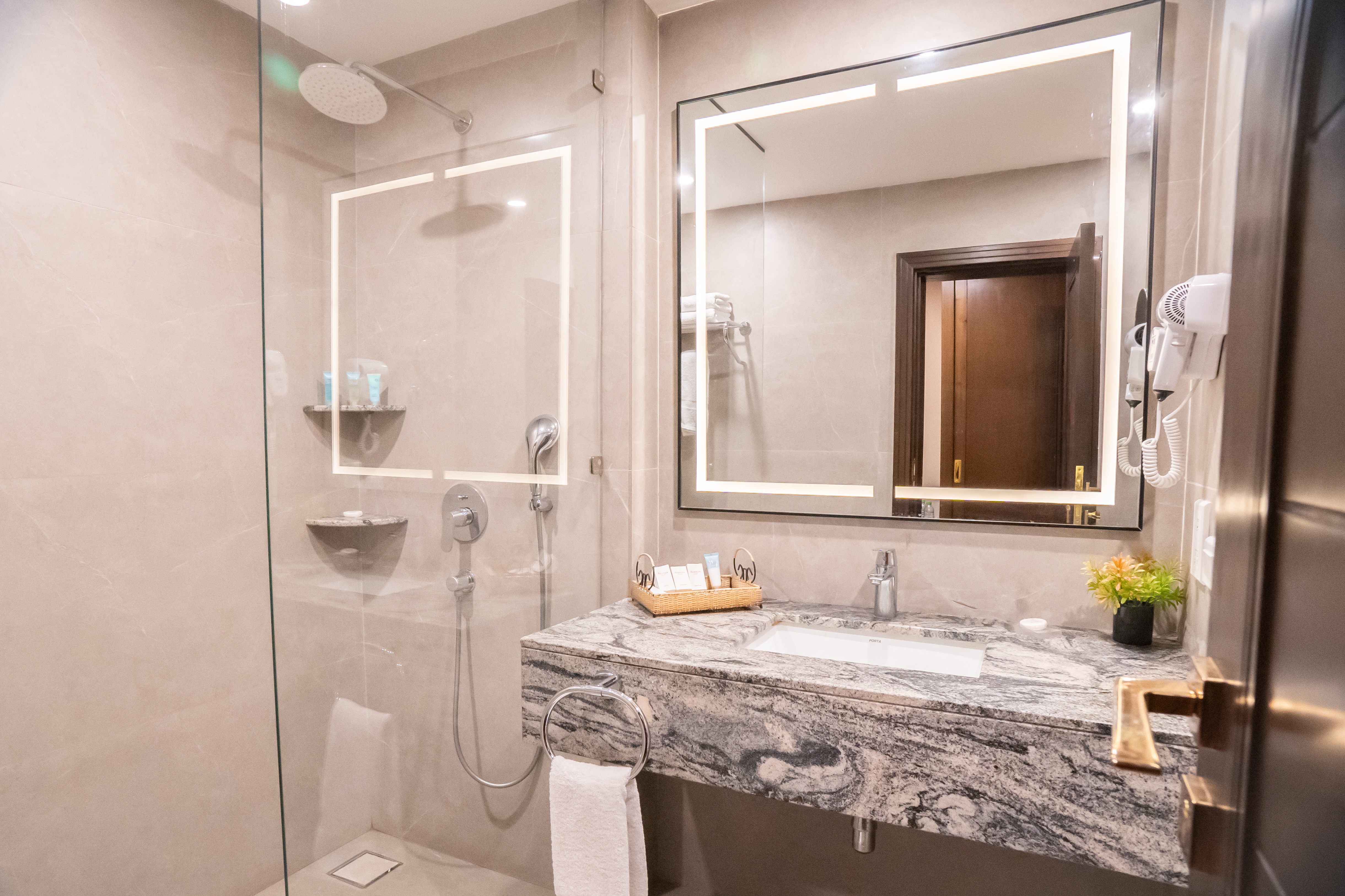 Guest room bath at the Ramada by Wyndham Murree Lower Topa Resort in Lower Topa, Murree, Other than US/Canada