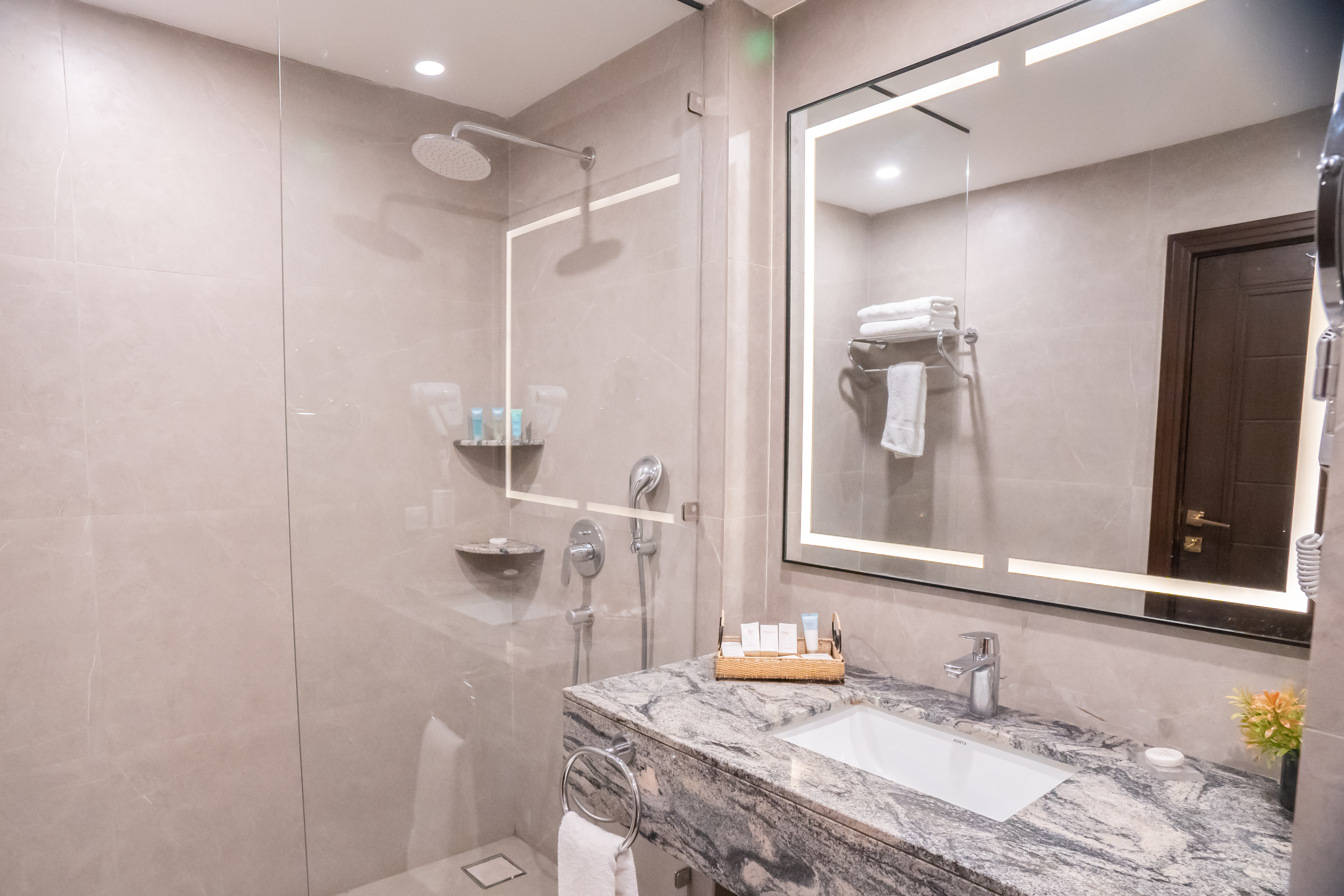 Guest room bath at the Ramada by Wyndham Murree Lower Topa Resort in Lower Topa, Murree, Other than US/Canada