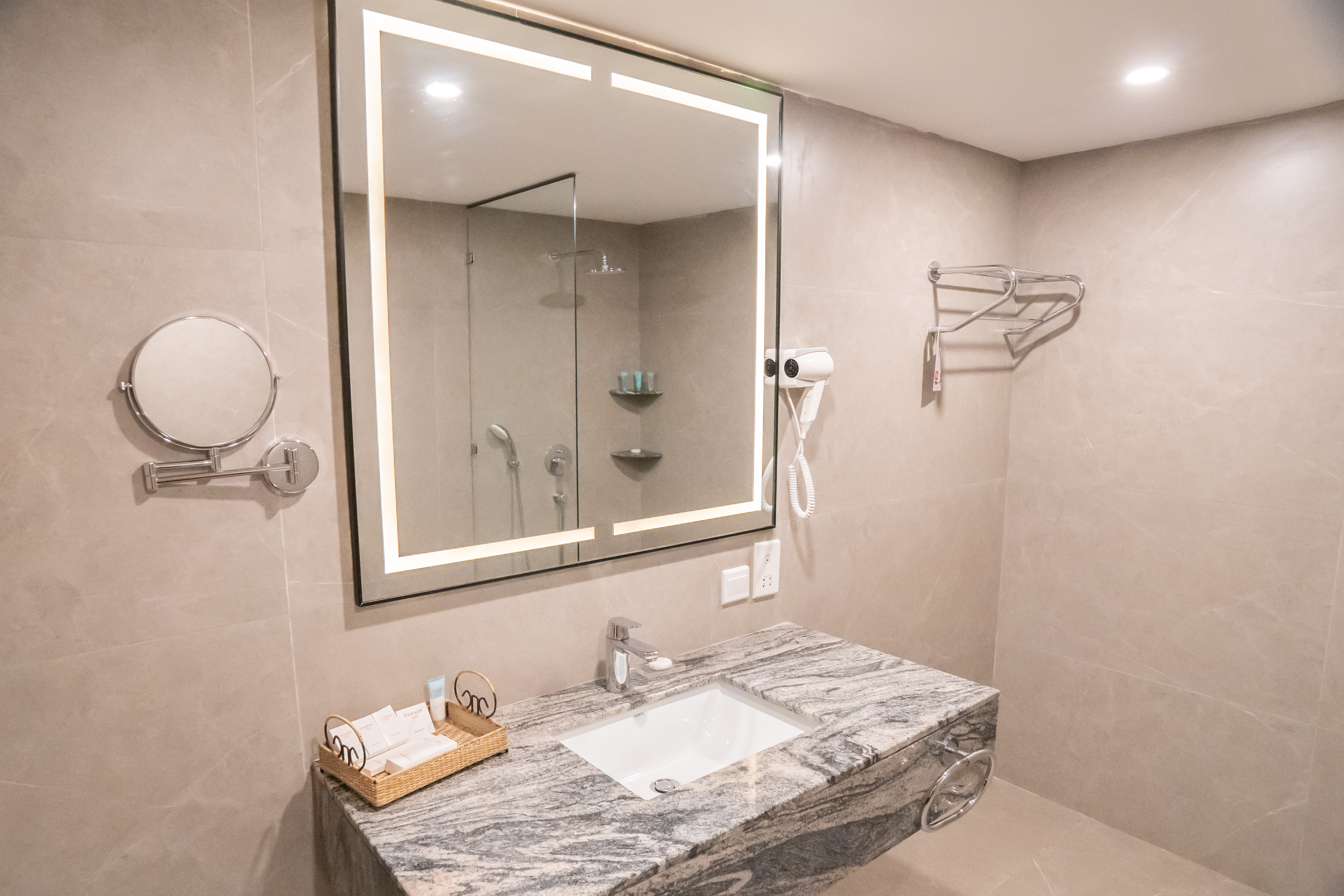 Guest room bath at the Ramada by Wyndham Murree Lower Topa Resort in Lower Topa, Murree, Other than US/Canada