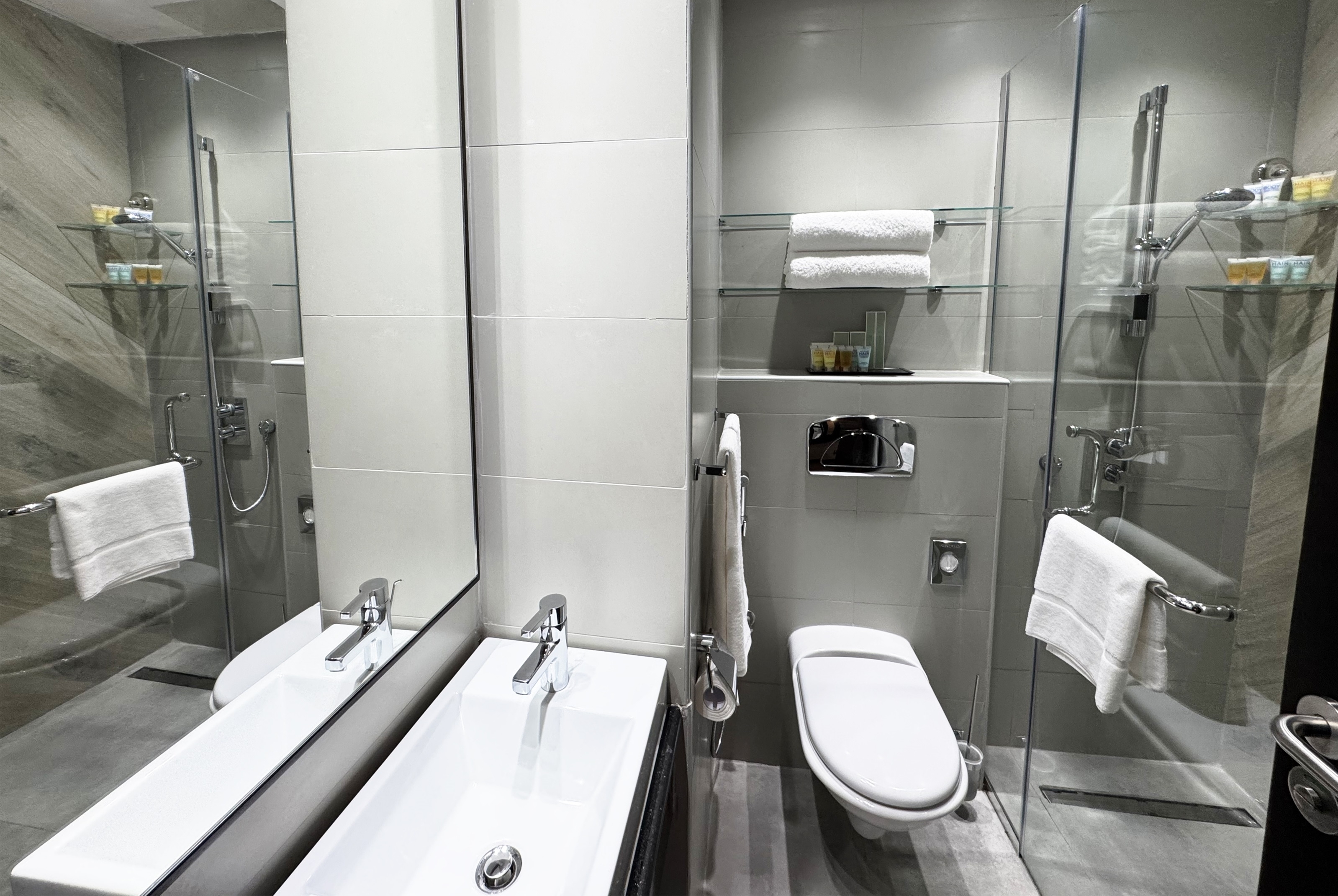 Guest room bath at the Ramada Encore by Wyndham Doha in Doha, Other than US/Canada