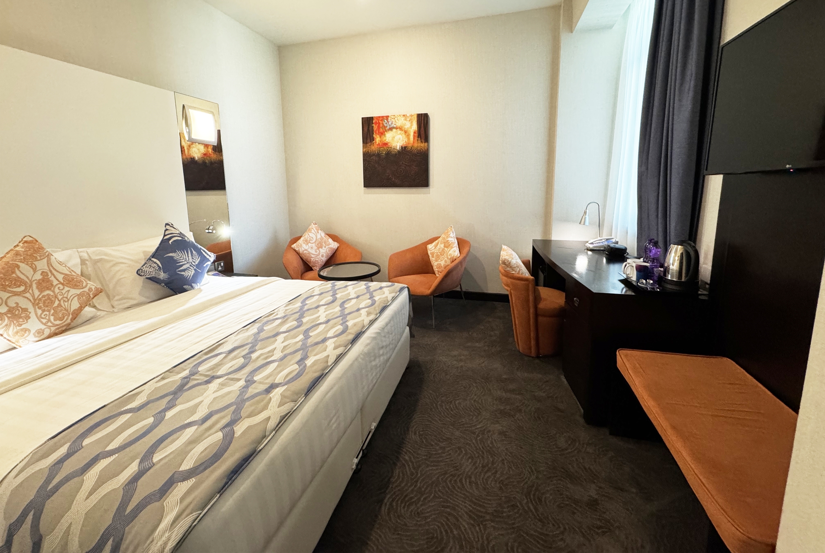 Guest room at the Ramada Encore by Wyndham Doha in Doha, Other than US/Canada