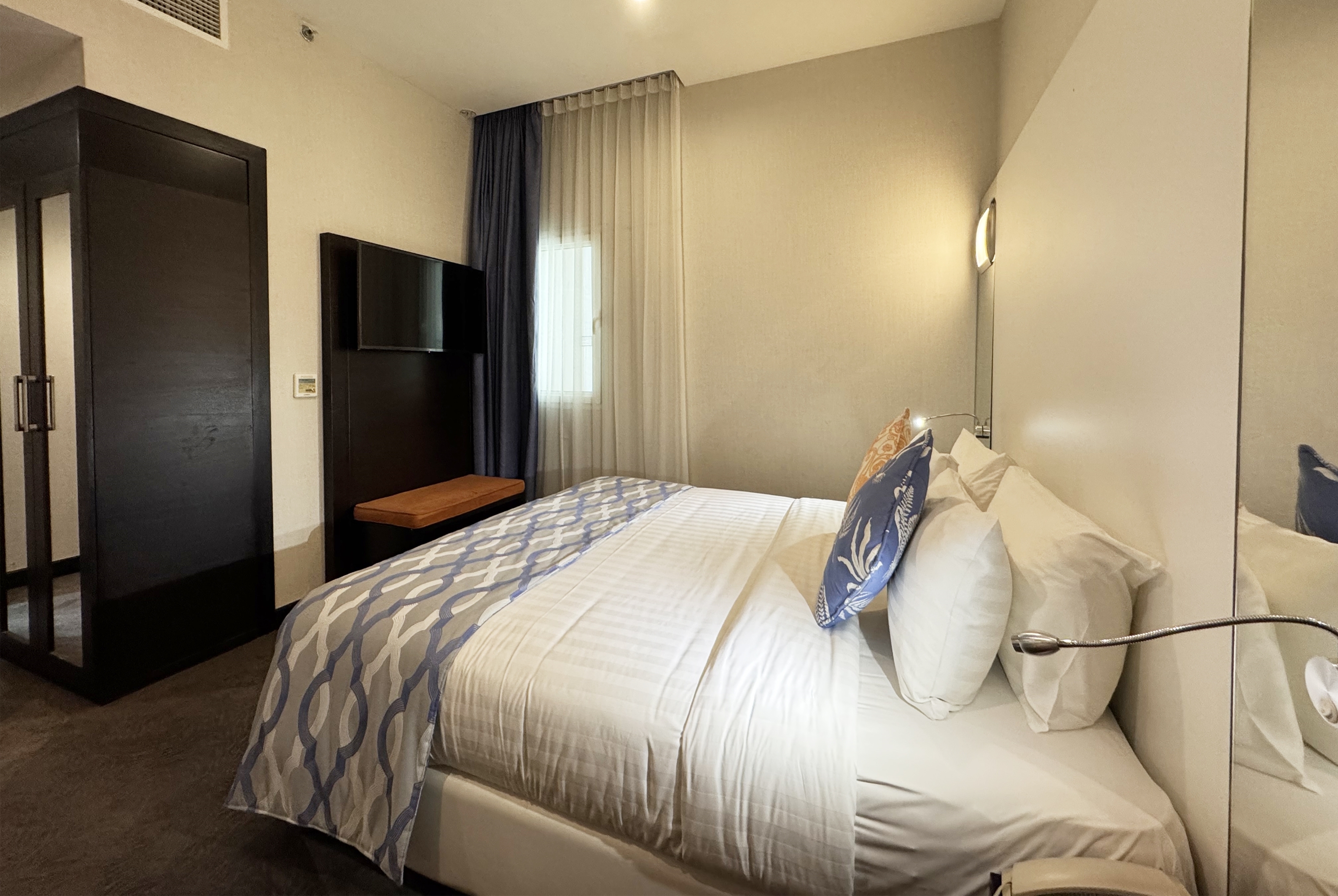 Guest room at the Ramada Encore by Wyndham Doha in Doha, Other than US/Canada