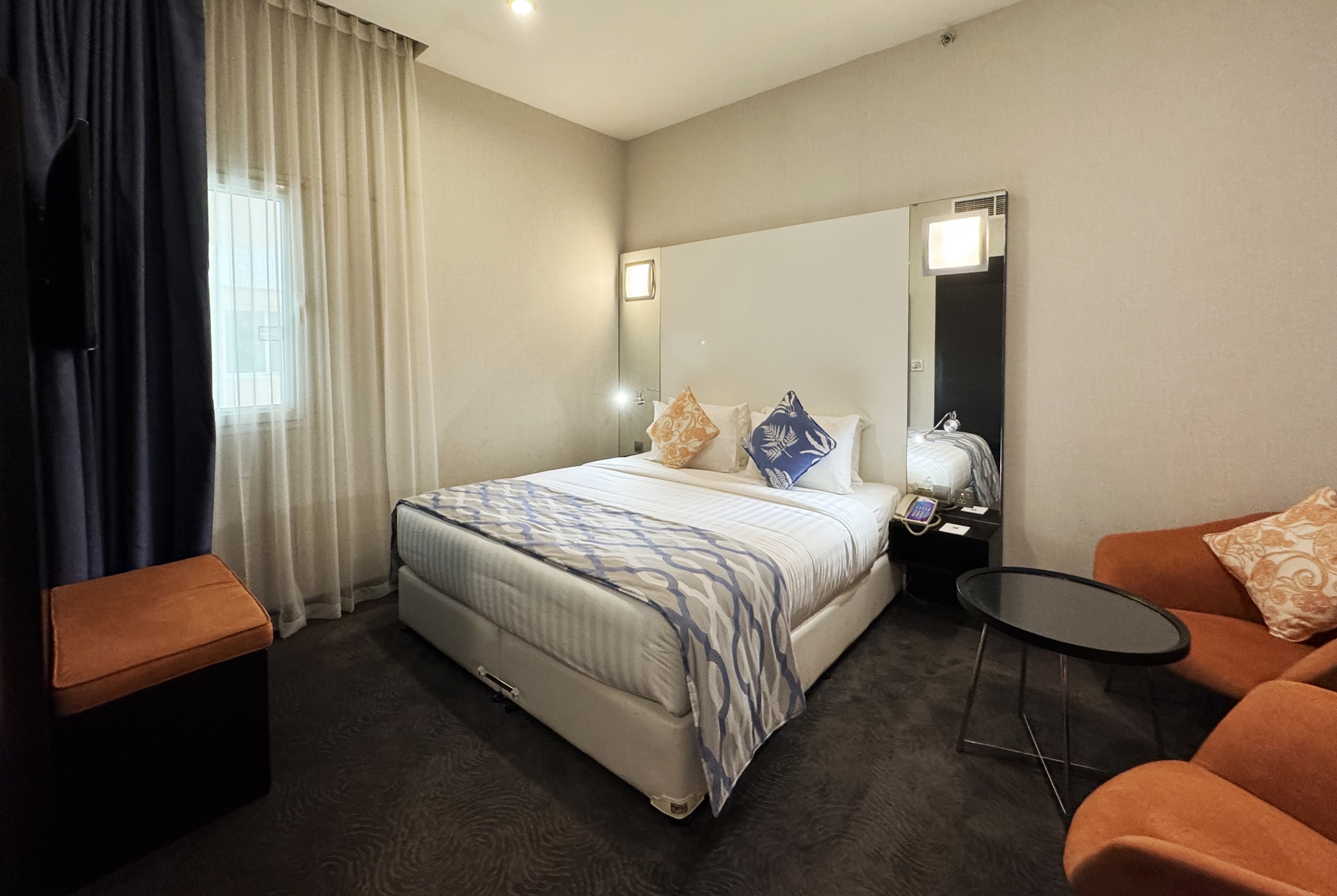 Guest room at the Ramada Encore by Wyndham Doha in Doha, Other than US/Canada