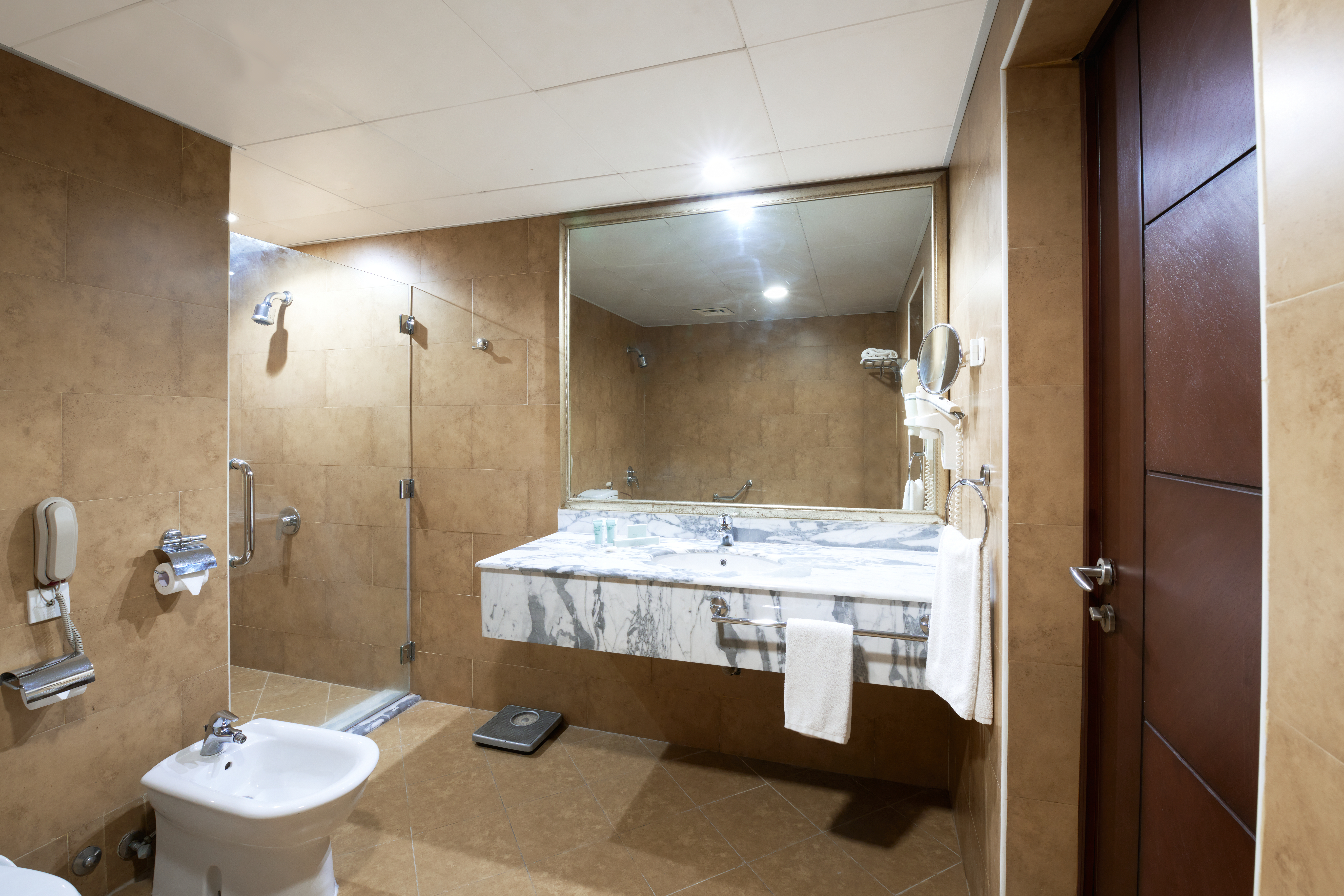 Guest room at the Ramada by Wyndham Doha Old Town in Doha, Other than US/Canada