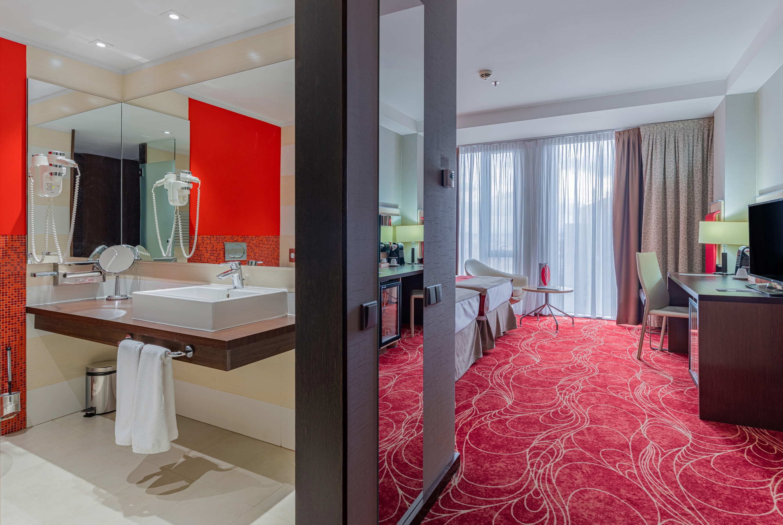 Guest room bath at the Ramada by Wyndham Sibiu in Sibiu, Other than US/Canada