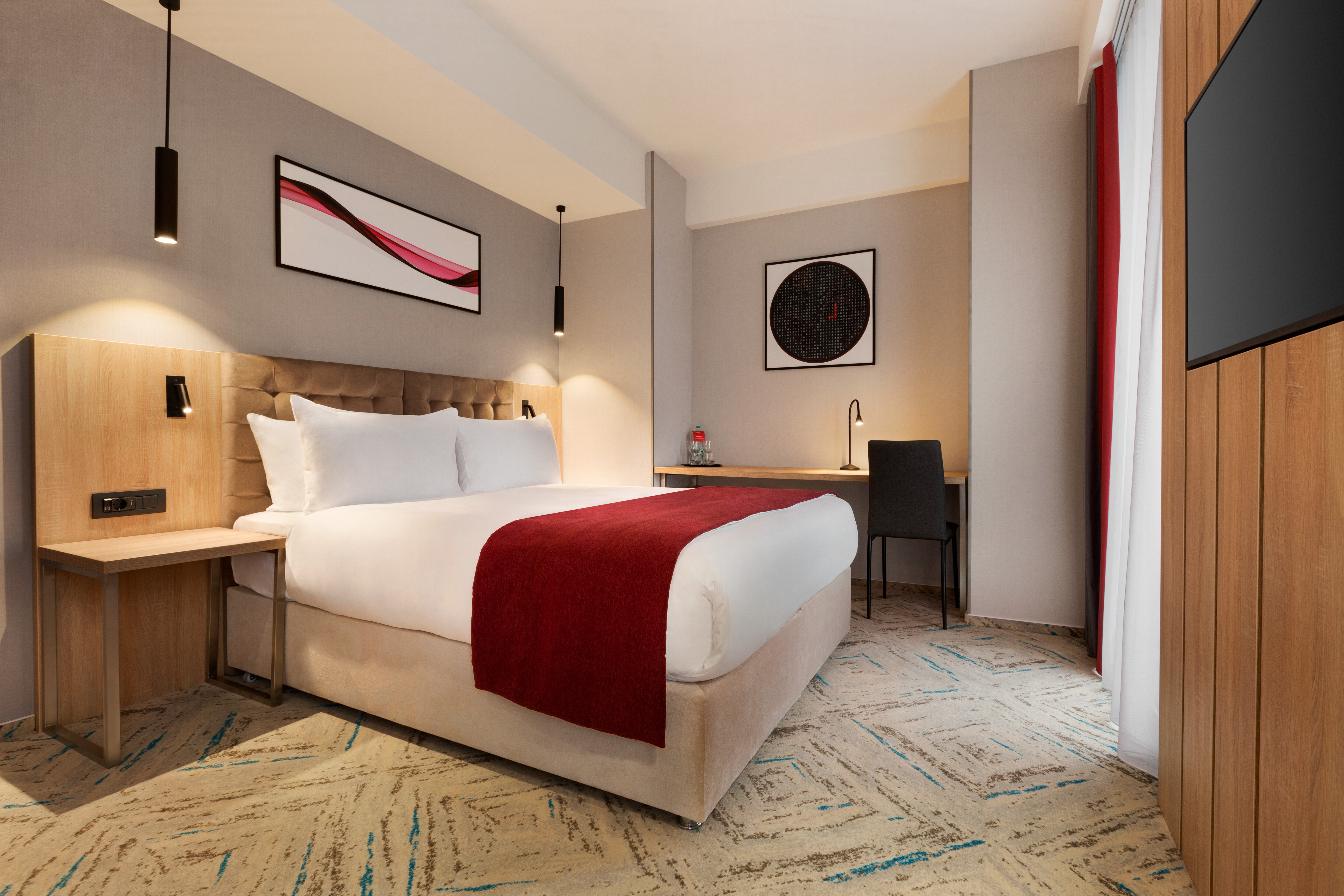 Guest room at the Ramada by Wyndham Targu Jiu in Targu Jiu, Other than US/Canada