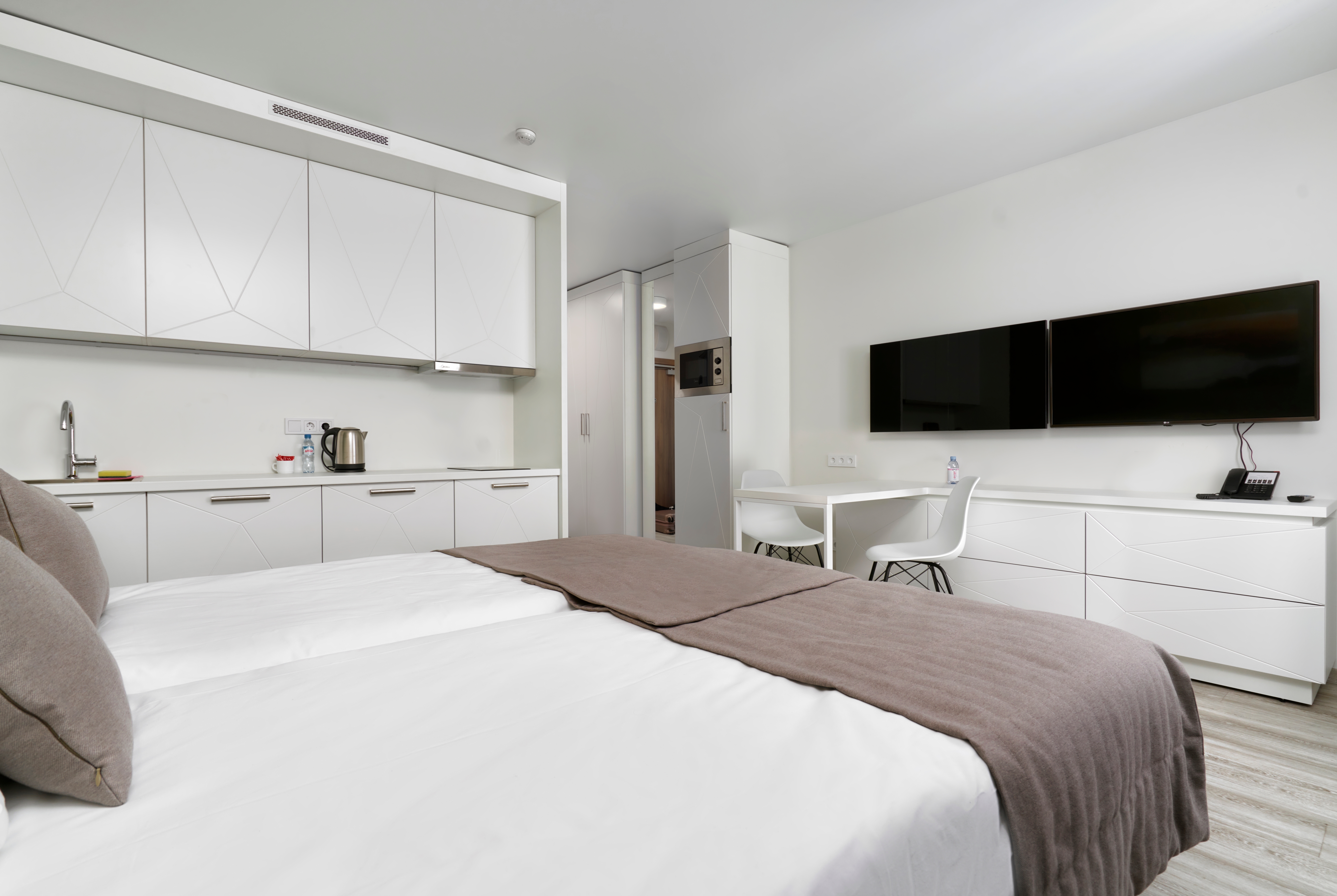 Guest room at the Ramada Plaza by Wyndham Saint Petersburg in St. Petersburg, Other than US/Canada