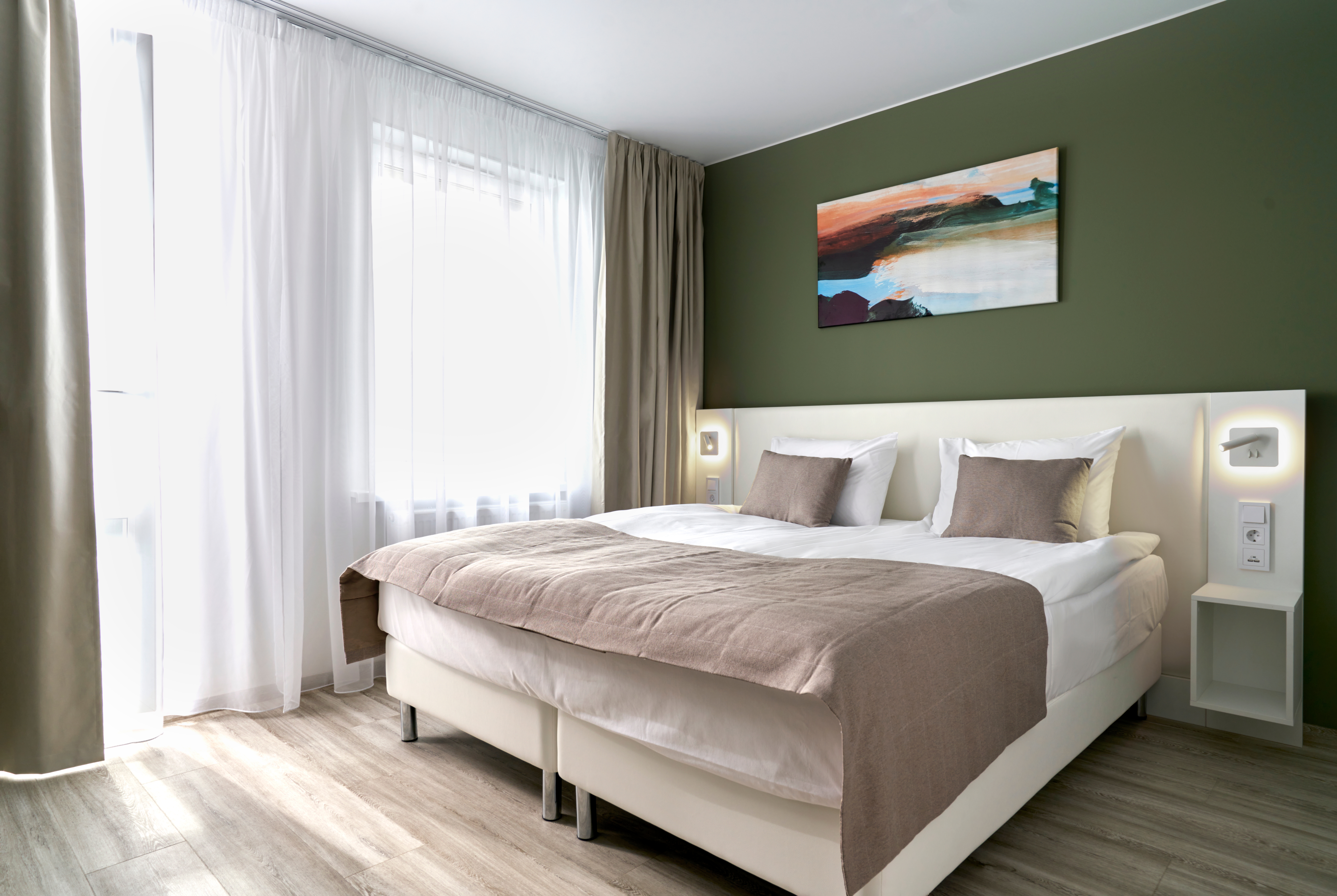 Guest room at the Ramada Plaza by Wyndham Saint Petersburg in St. Petersburg, Other than US/Canada