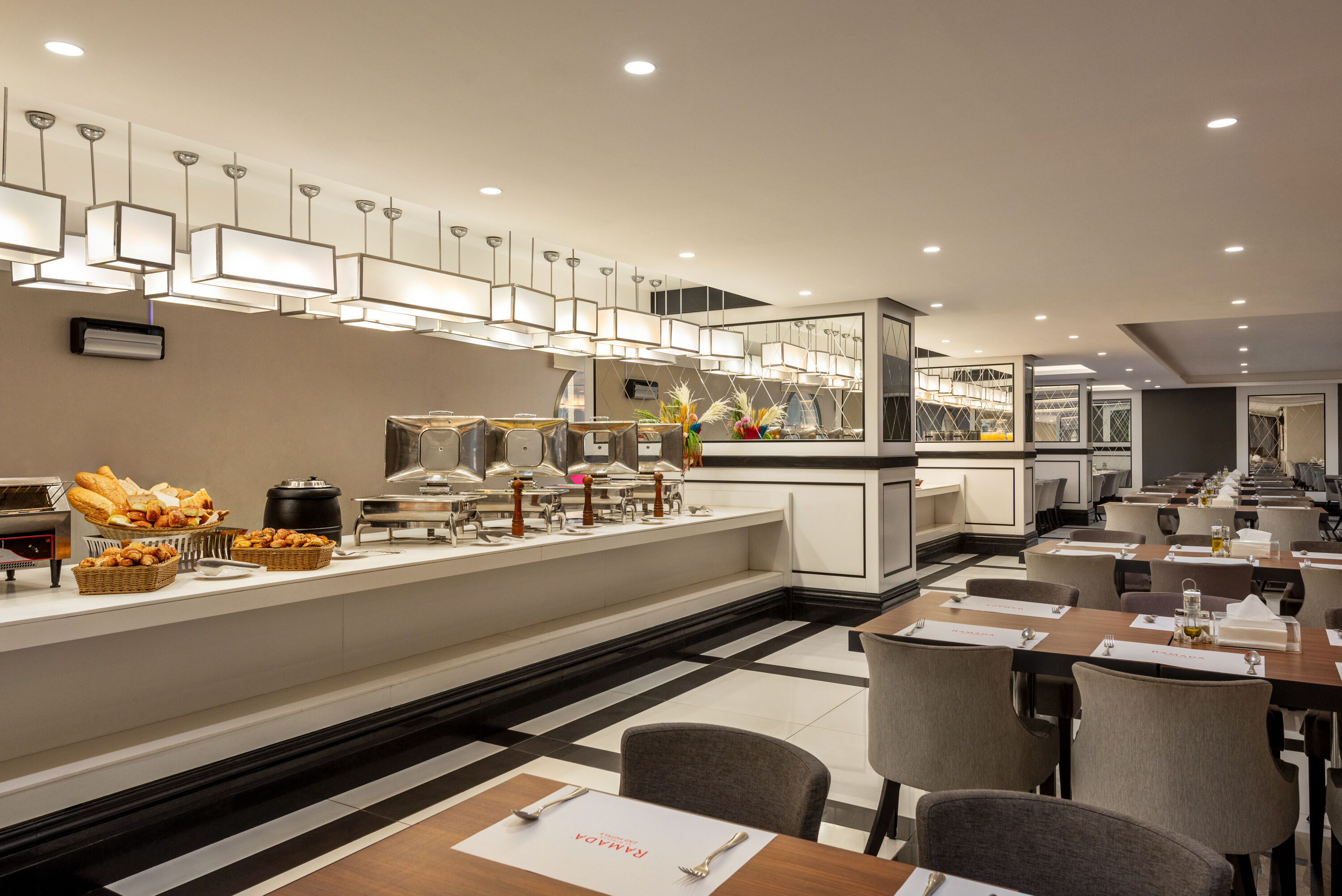 Ramada by Wyndham Makkah Zad Al Rawda restaurant breakfast area with seating in Makkah, Other than US/Canada