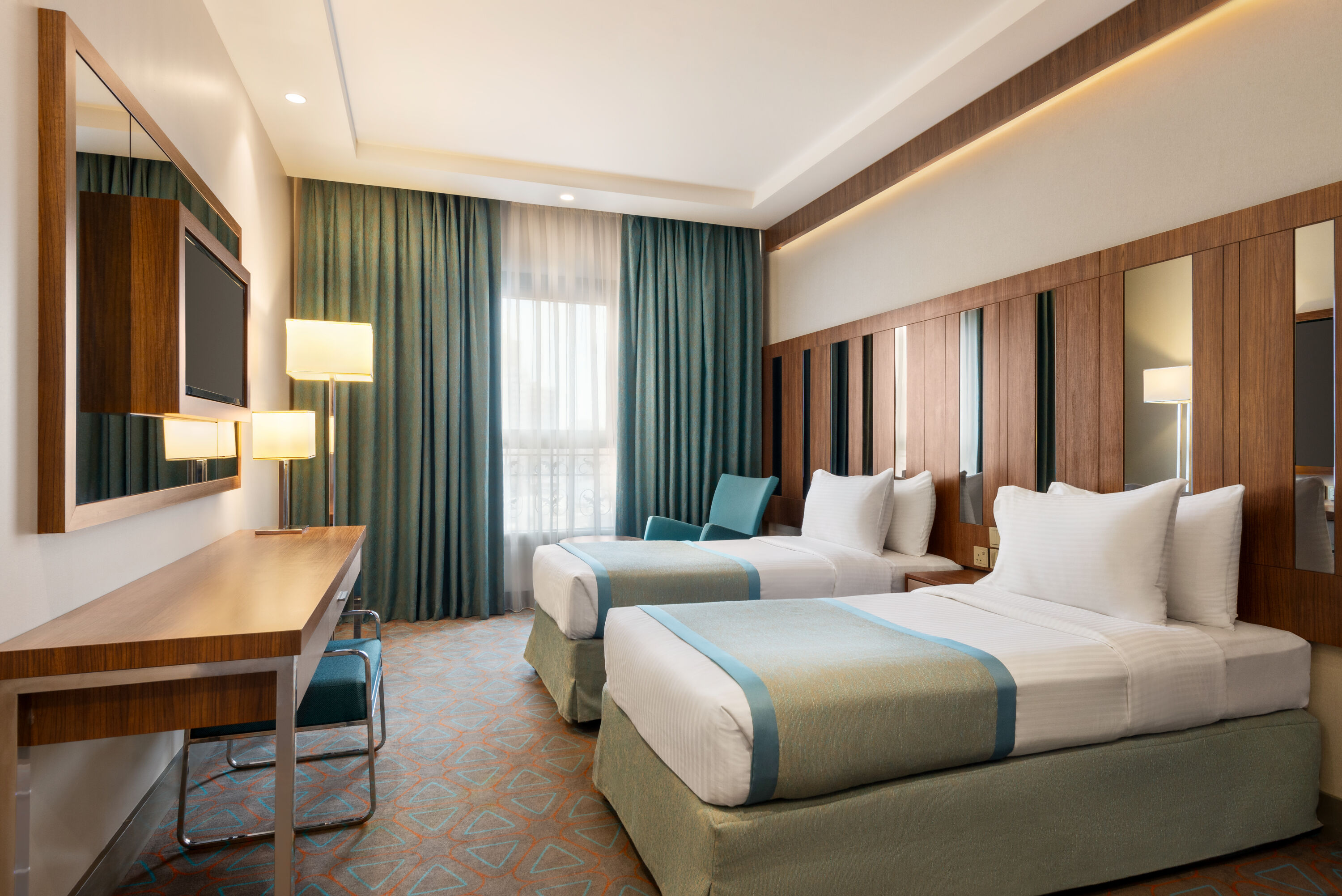 Guest room at the Ramada by Wyndham Makkah Zad Al Tayseer in Makkah, Other than US/Canada