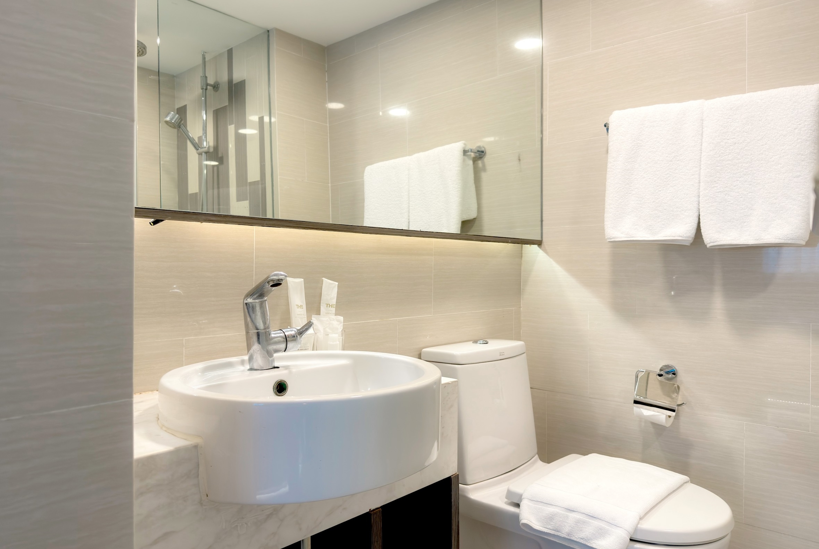 Guest room bath at the Ramada by Wyndham Bangkok Sukhumvit 11 in Bangkok, Other than US/Canada