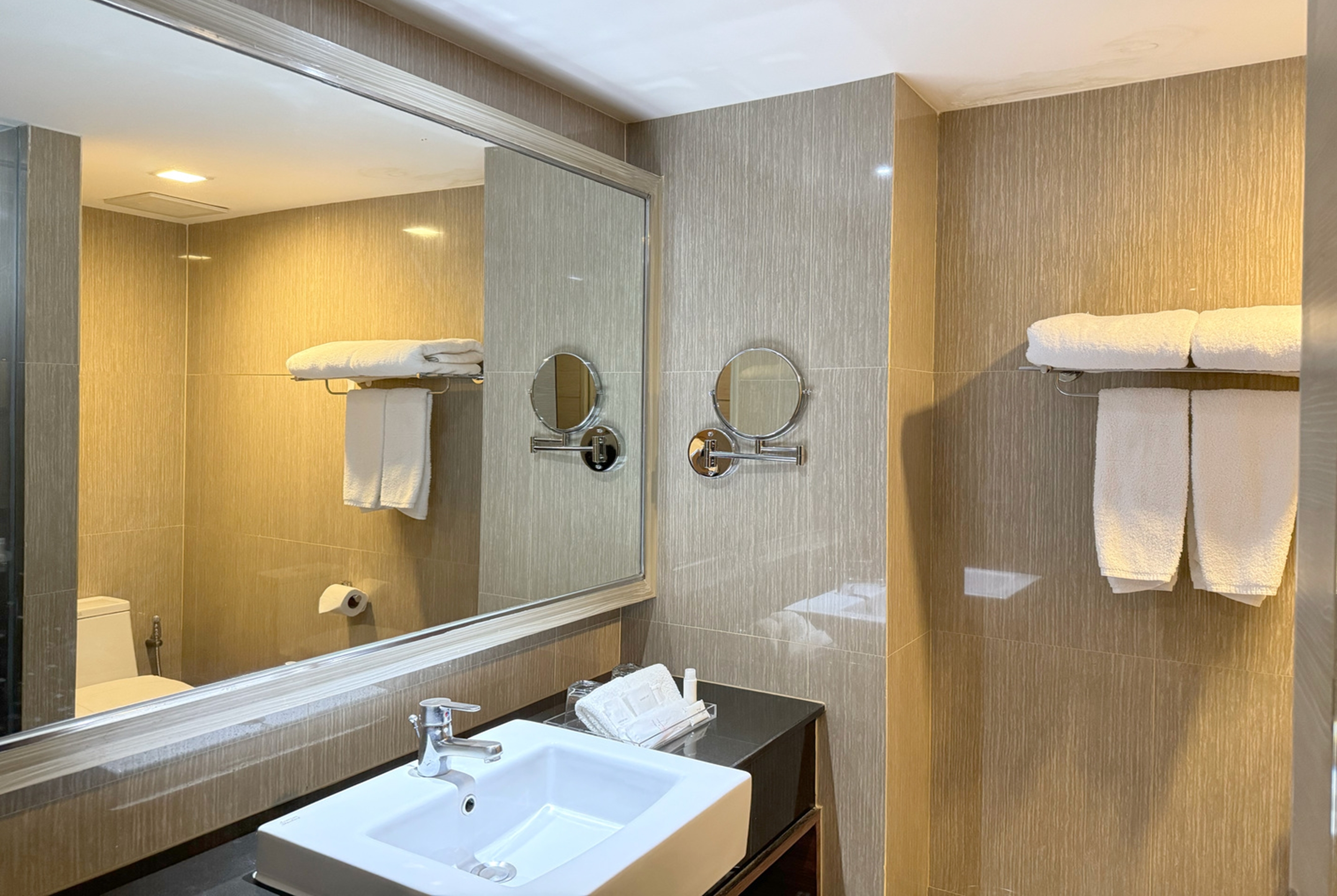 Guest room bath at the Ramada by Wyndham Bangkok Sukhumvit 11 in Bangkok, Other than US/Canada