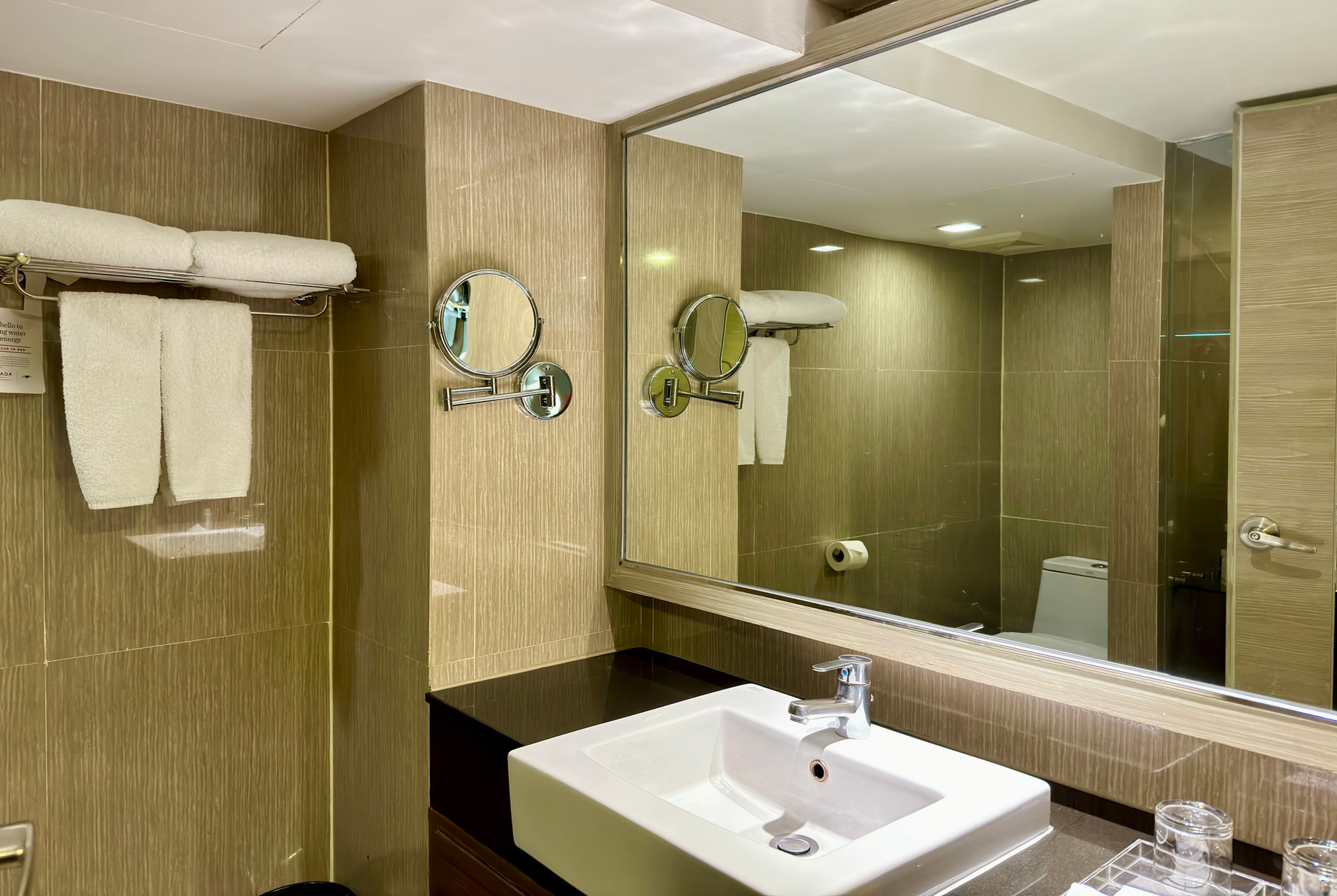 Guest room bath at the Ramada by Wyndham Bangkok Sukhumvit 11 in Bangkok, Other than US/Canada