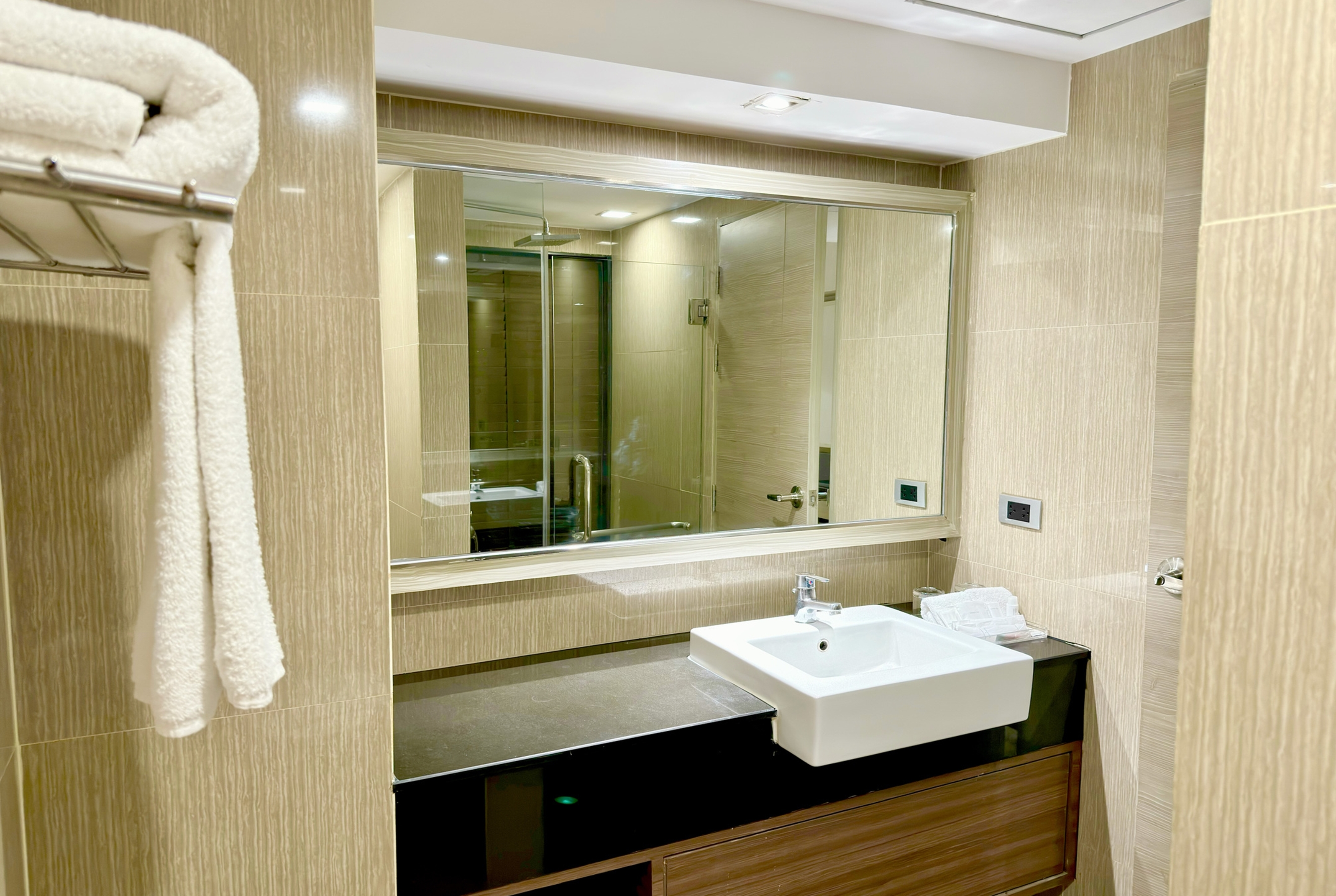 Guest room bath at the Ramada by Wyndham Bangkok Sukhumvit 11 in Bangkok, Other than US/Canada