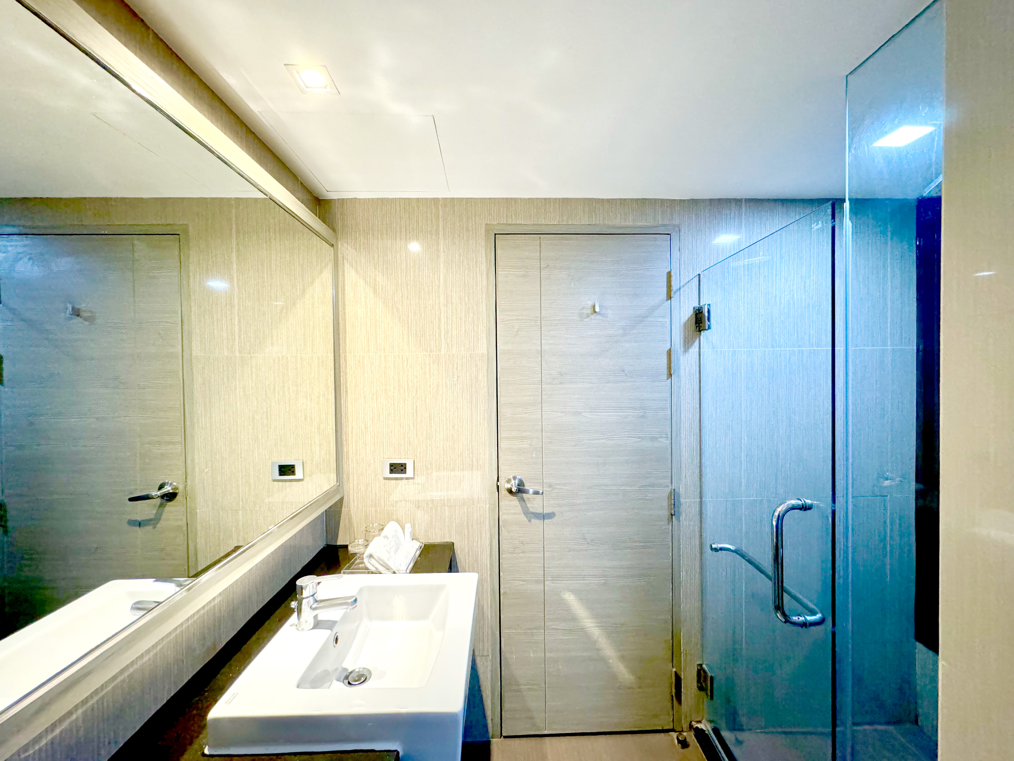 Guest room bath at the Ramada by Wyndham Bangkok Sukhumvit 11 in Bangkok, Other than US/Canada