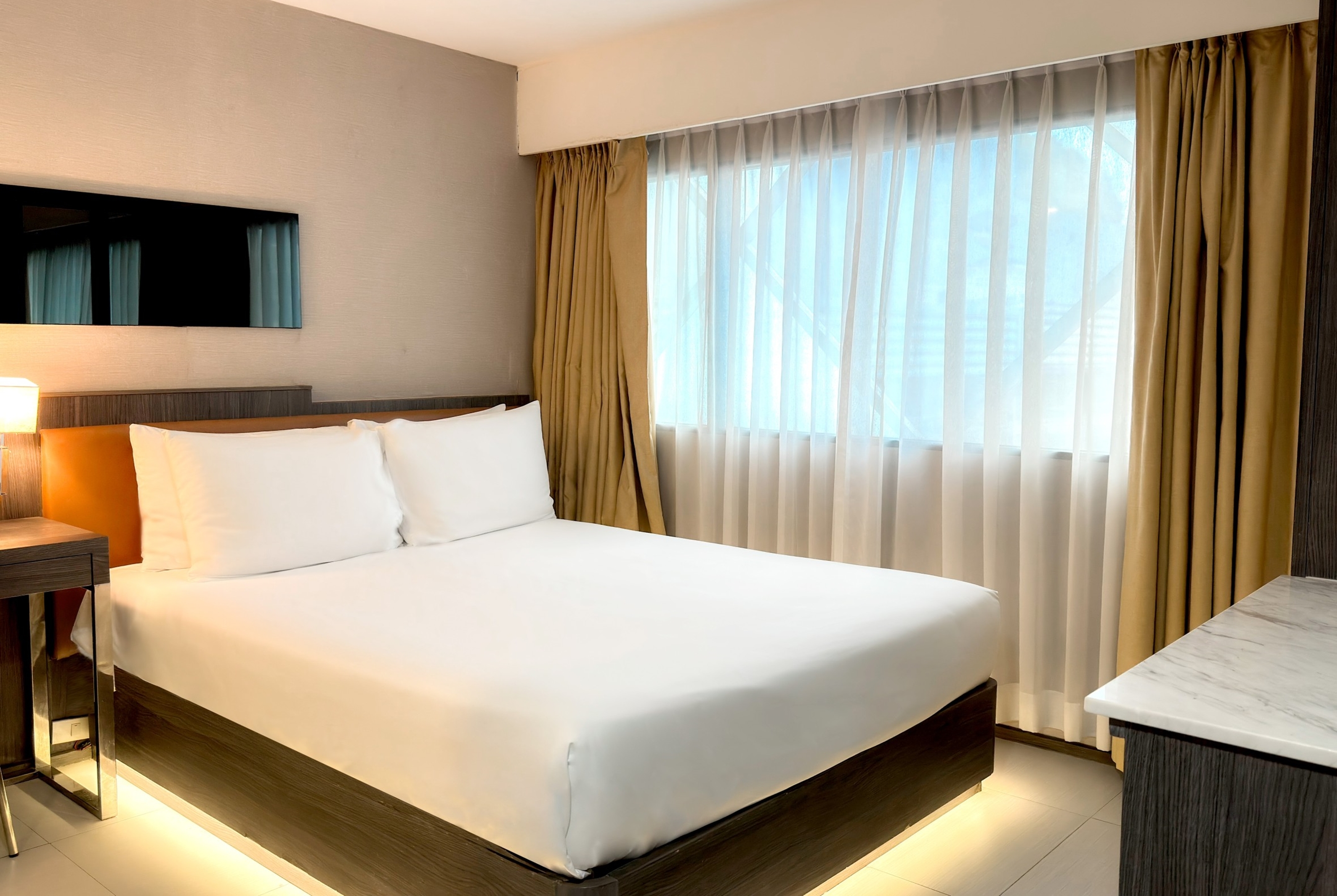 Guest room at the Ramada by Wyndham Bangkok Sukhumvit 11 in Bangkok, Other than US/Canada