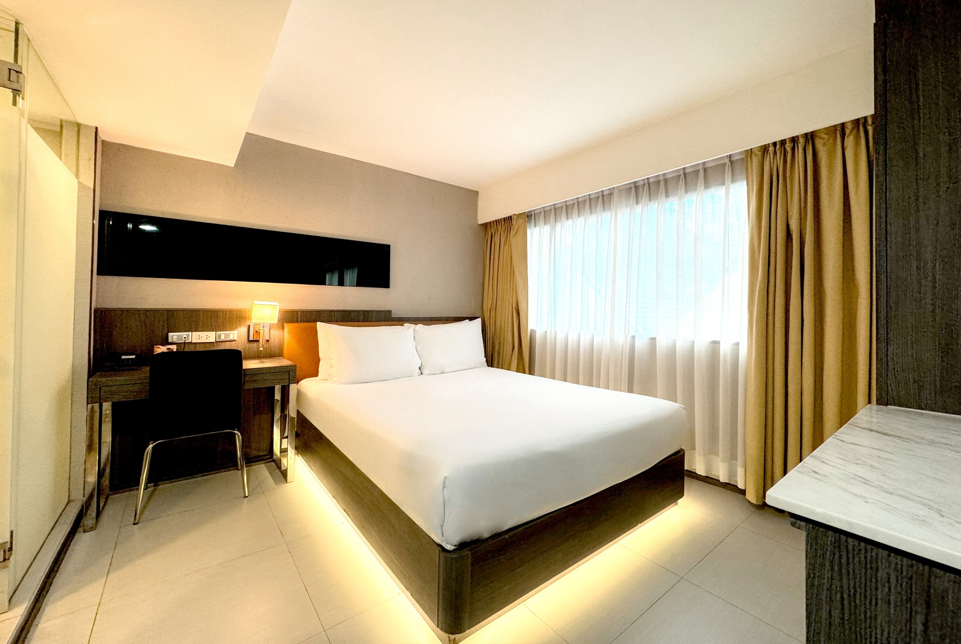 Guest room at the Ramada by Wyndham Bangkok Sukhumvit 11 in Bangkok, Other than US/Canada