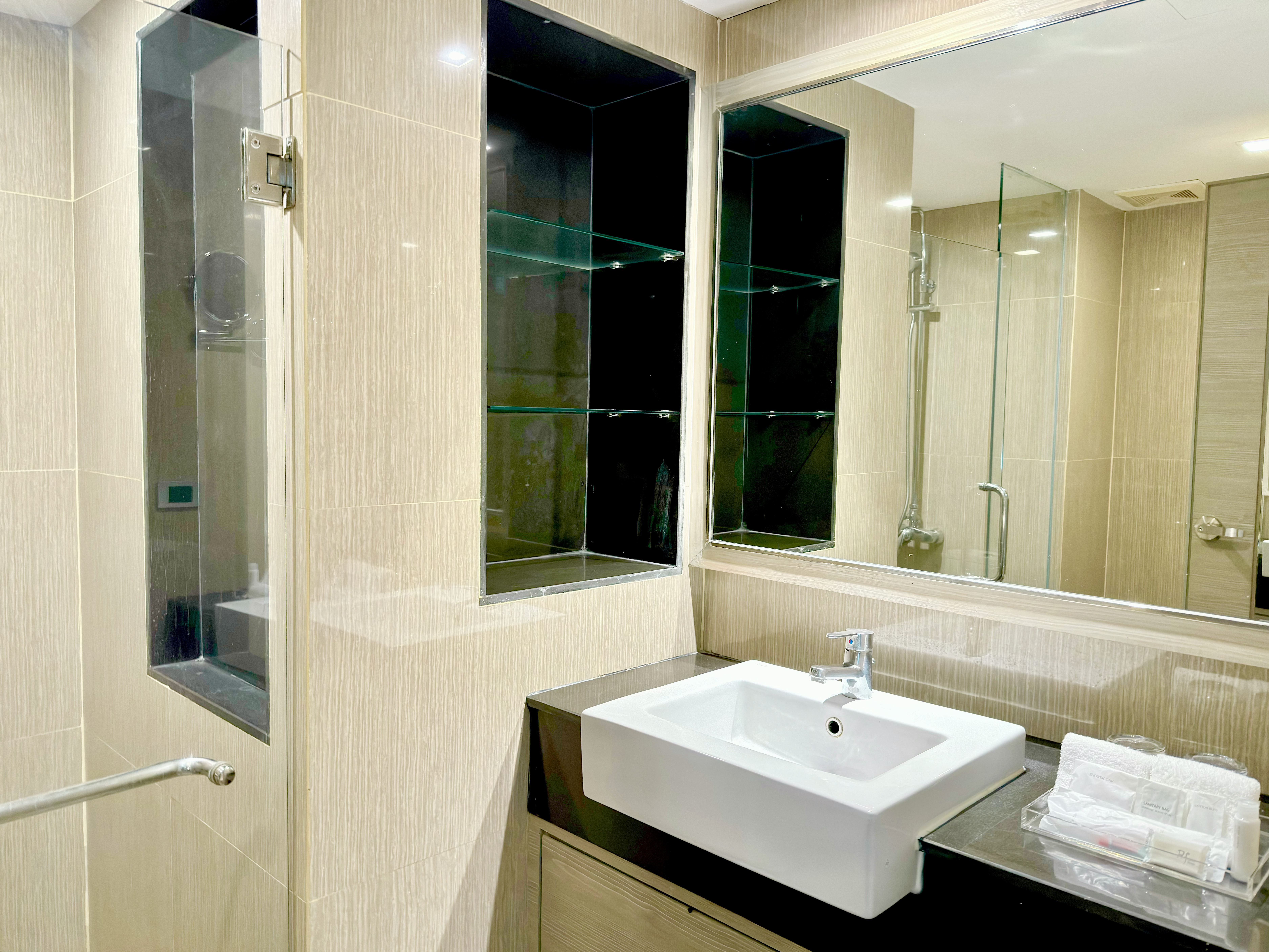 Guest room bath at the Ramada by Wyndham Bangkok Sukhumvit 11 in Bangkok, Other than US/Canada