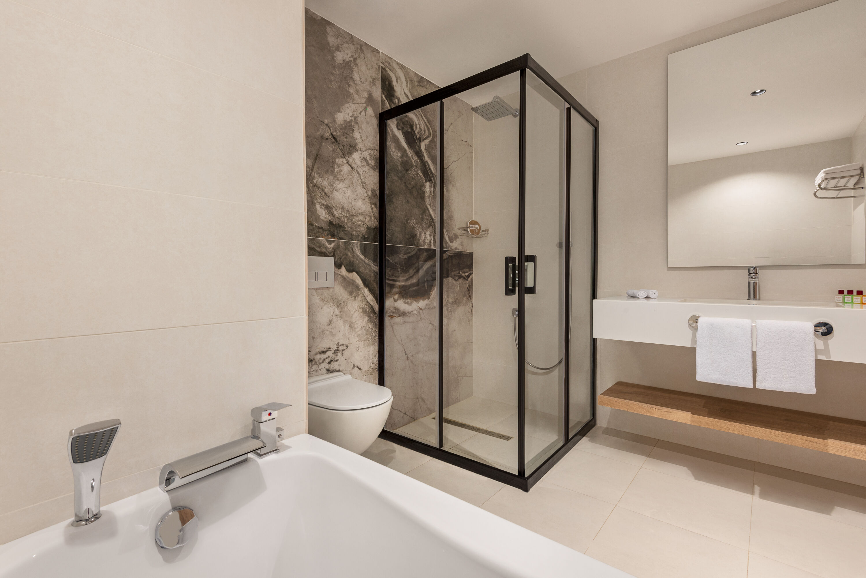 Guest room bath at the Ramada Plaza By Wyndham Batman in Batman, Other than US/Canada