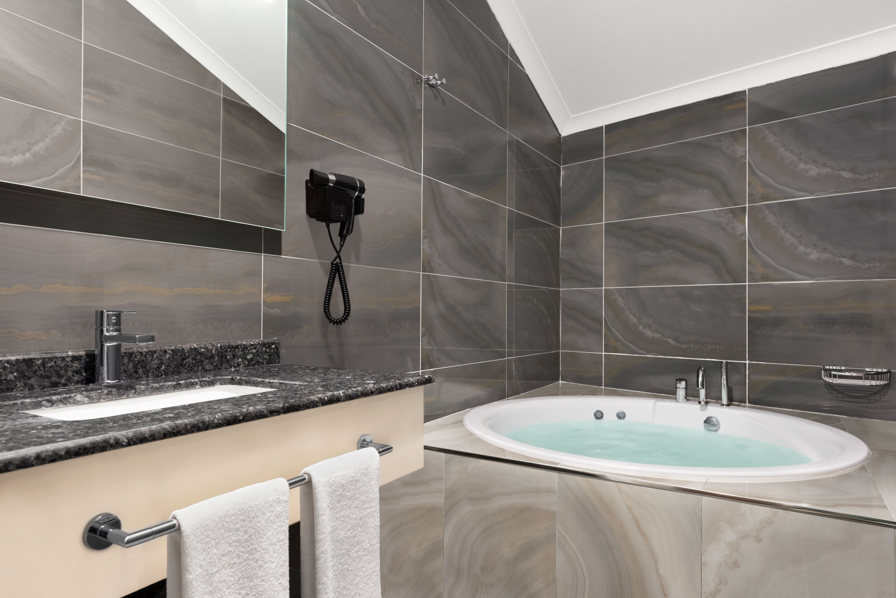 Guest room bath at the Ramada by Wyndham Sakarya Hendek in Hendek, Other than US/Canada
