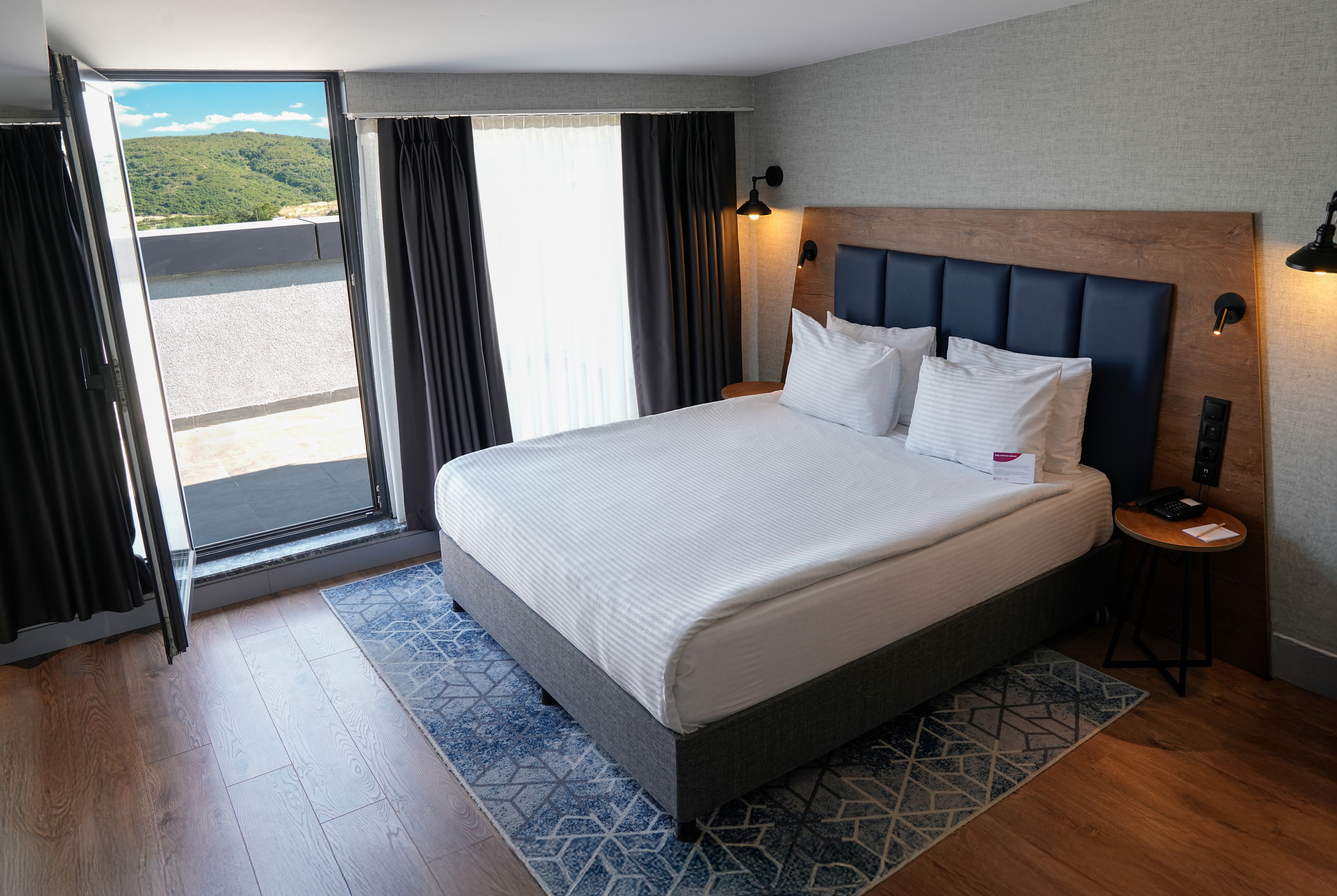 Guest room at the Ramada Encore by Wyndham Istanbul Arnavutkoy in Istanbul, Other than US/Canada