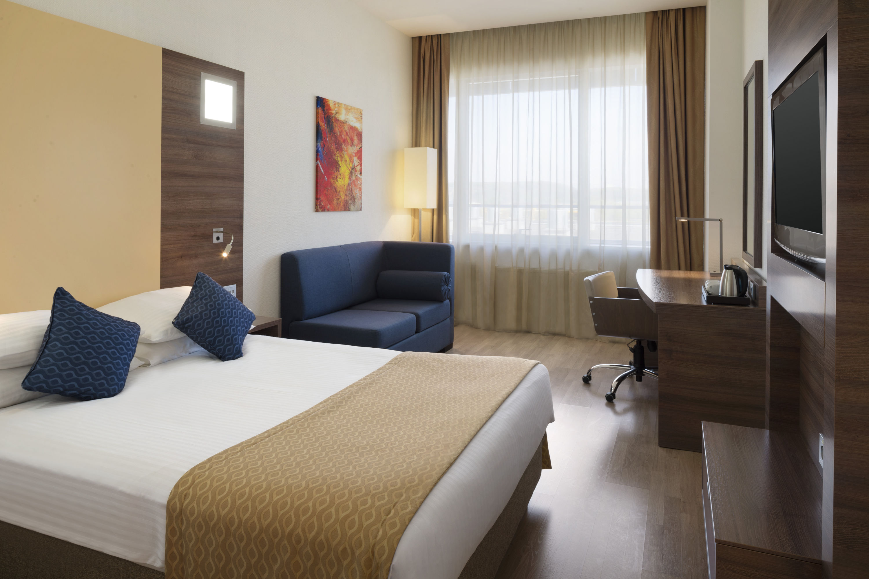 Guest room at the Ramada Encore by Wyndham Kyiv in Kiev, Other than US/Canada