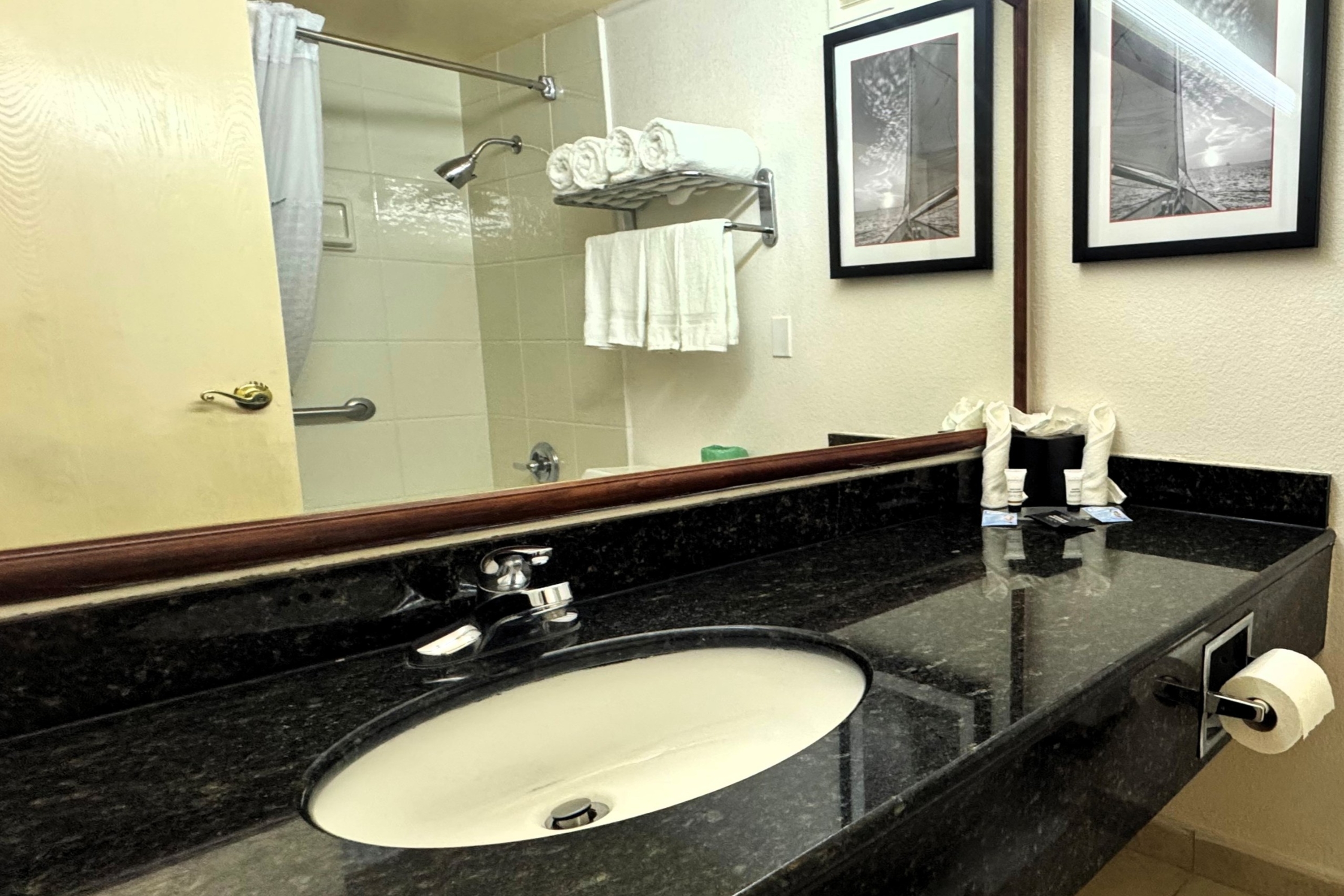 Guest room bath at the Ramada by Wyndham Birmingham Airport in Birmingham, Alabama