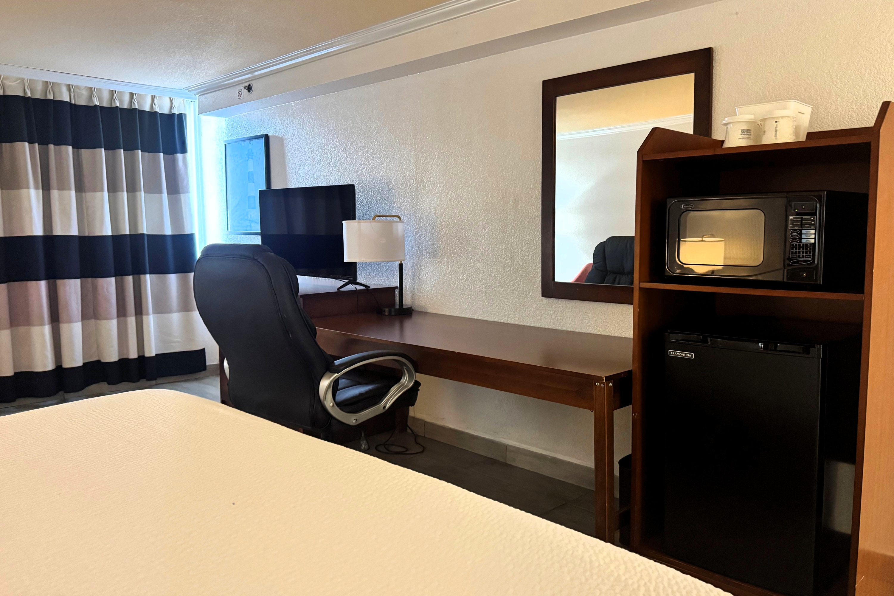Guest room at the Ramada by Wyndham Birmingham Airport in Birmingham, Alabama