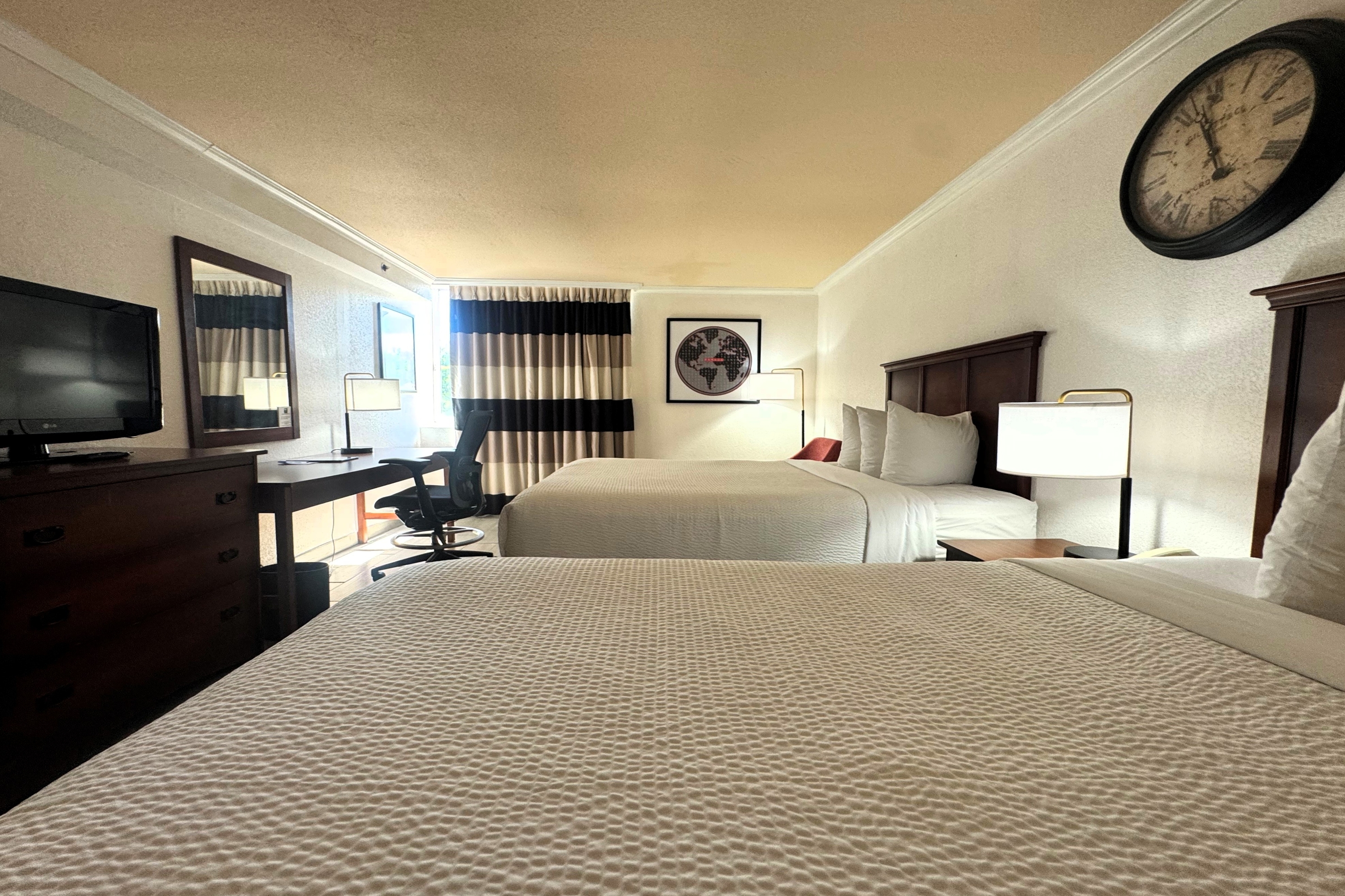 Guest room at the Ramada by Wyndham Birmingham Airport in Birmingham, Alabama